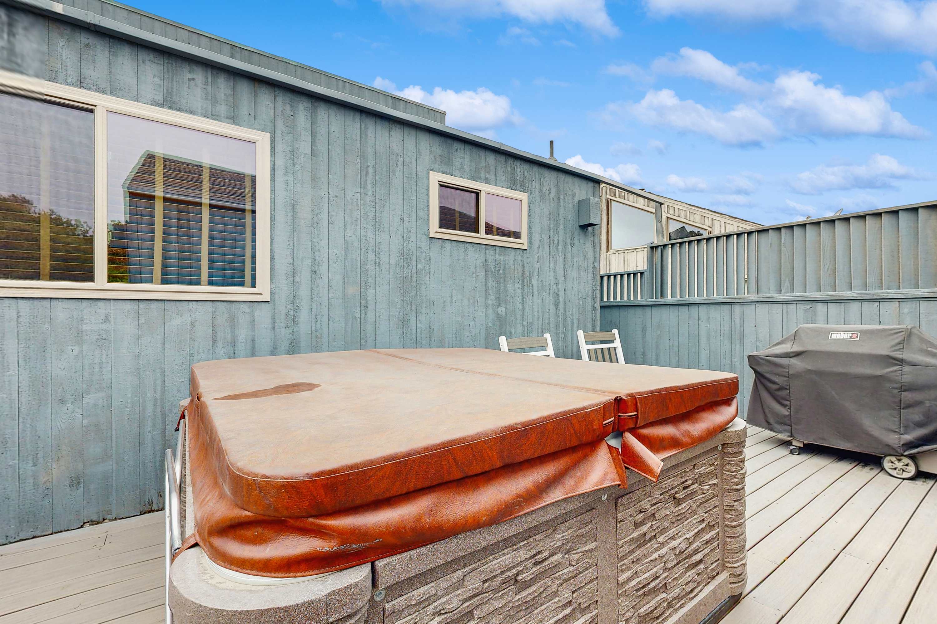 After a day of exploring, unwind in the private hot tub under the stars, a perfect end to your coastal adventure.