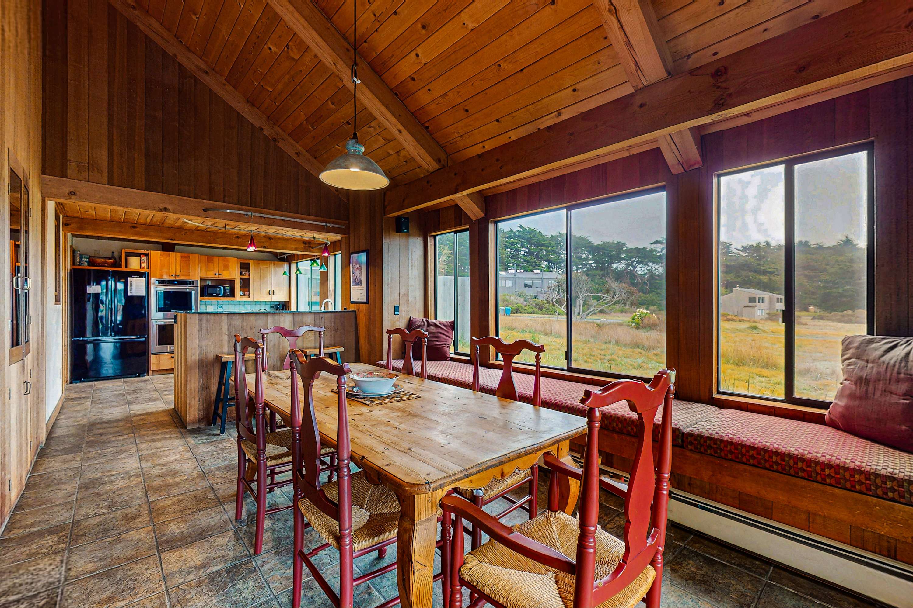 Share meals and laughter at the dining table, with panoramic views of the surrounding beauty creating the perfect backdrop.