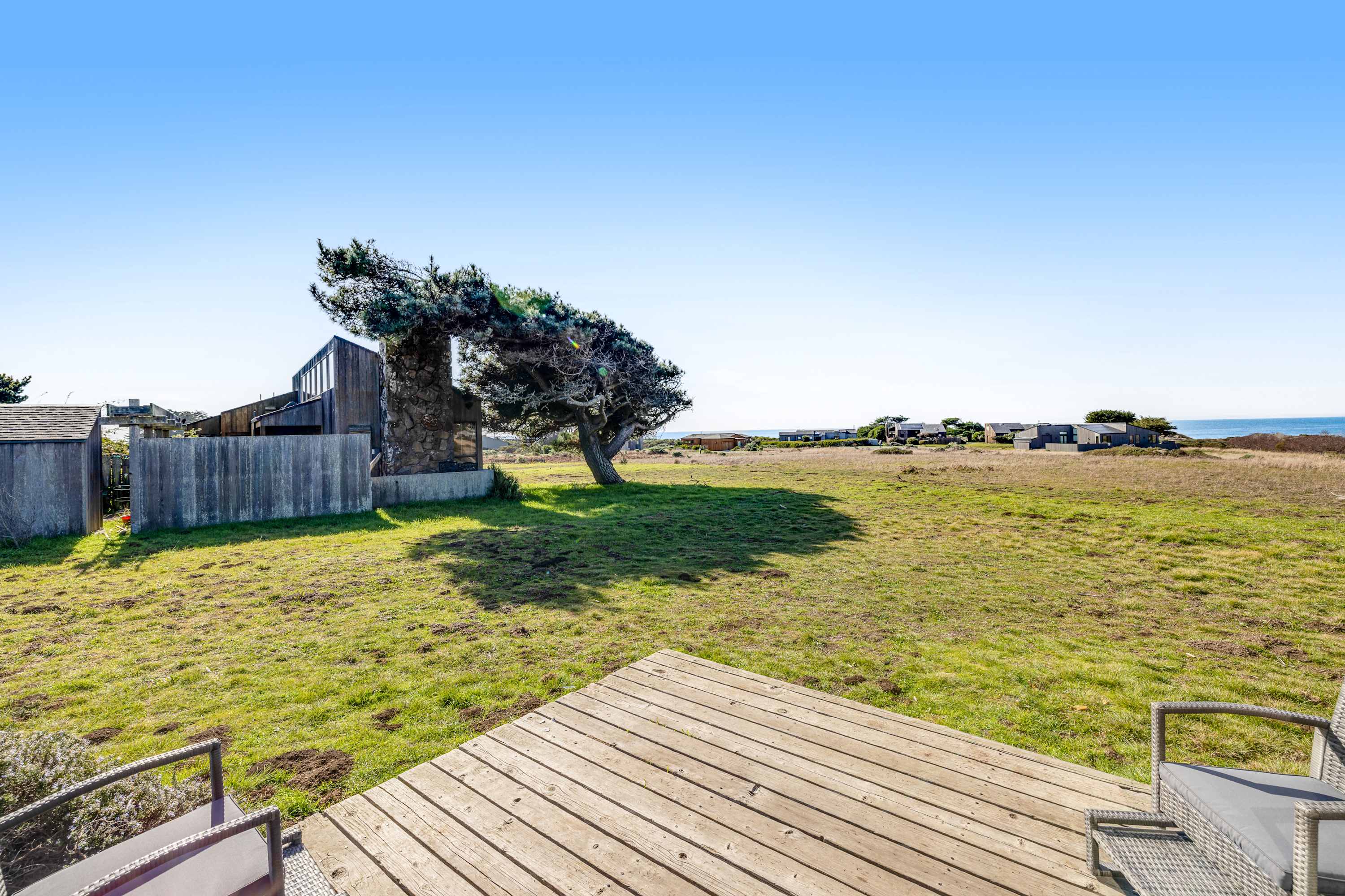 From the spacious deck, gaze out over the expansive landscape and let the tranquility of the coastal air refresh your spirit.
