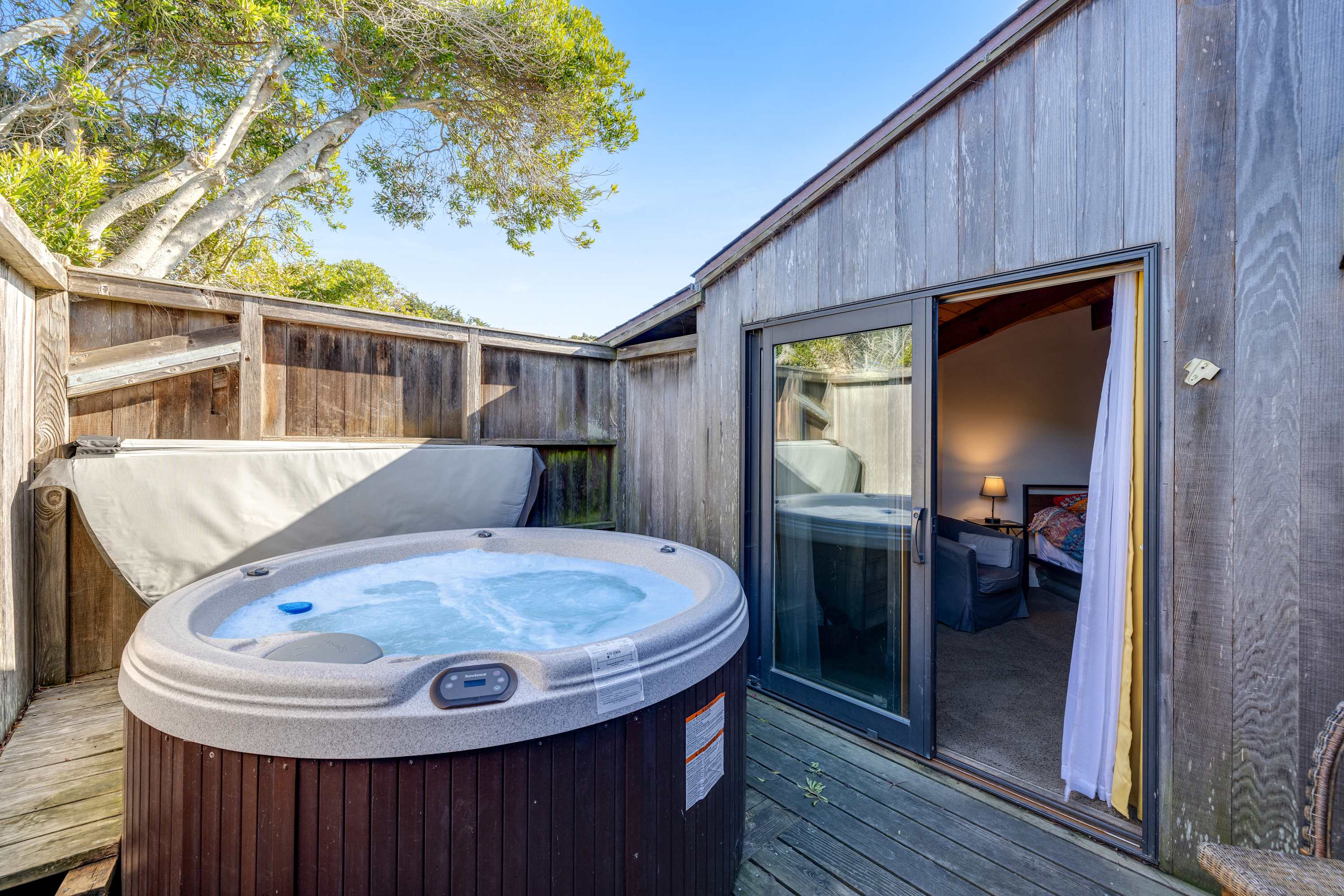 Your private hot tub awaits! Imagine soaking under the stars after a day of adventure, surrounded by the soothing sounds of nature.