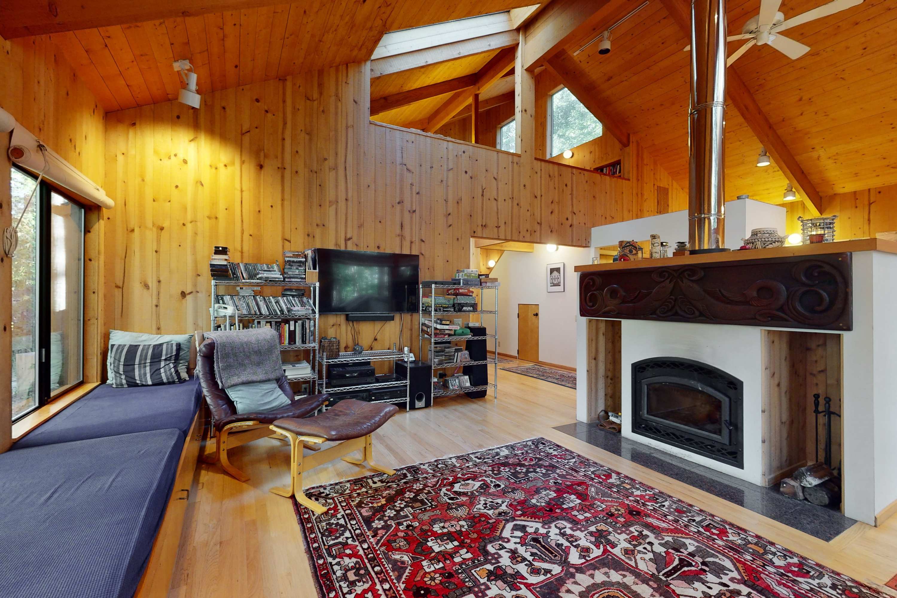 Gather around the wood-burning fireplace in the living room, where cozy evenings await, filled with laughter and stories shared with loved ones.