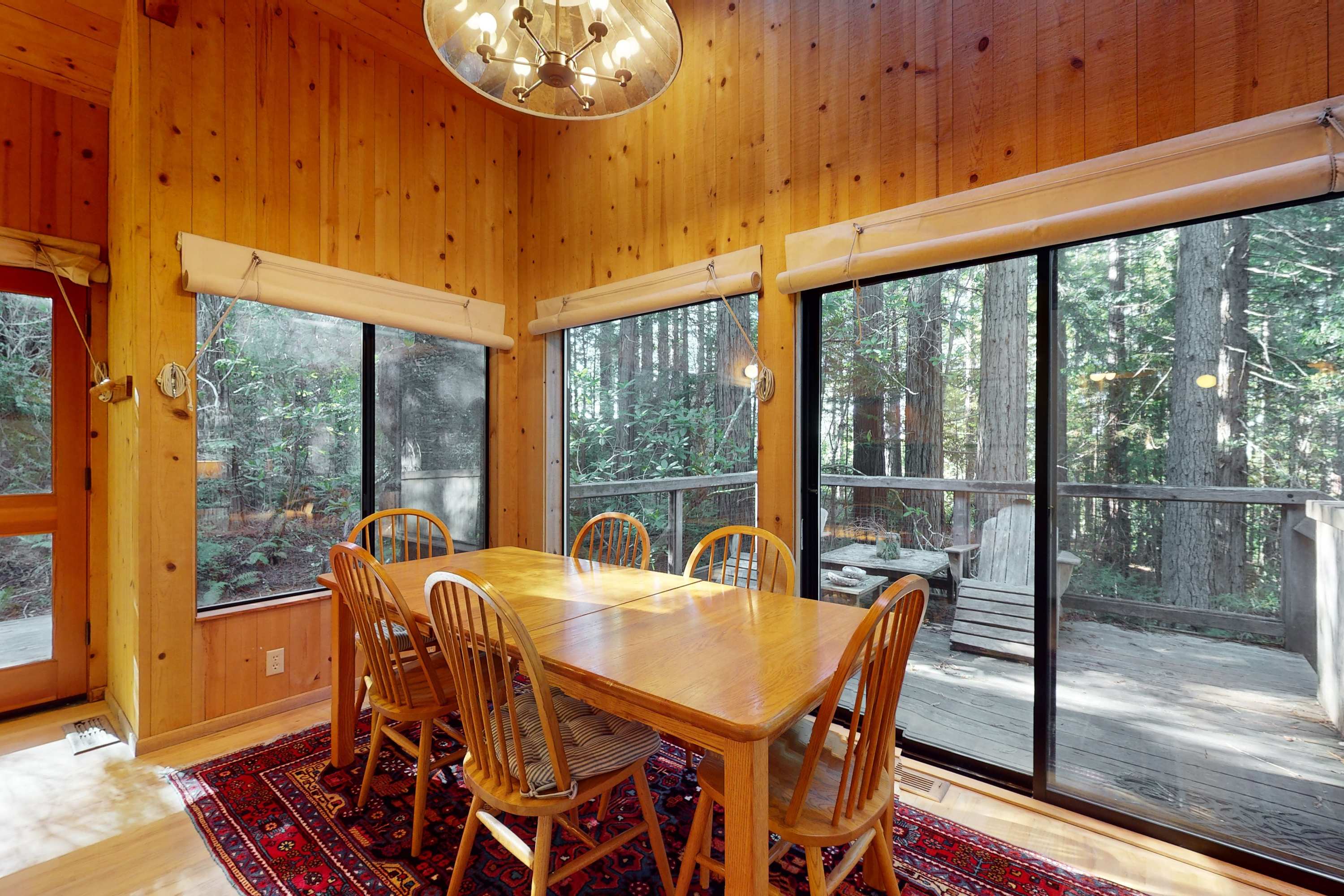 Share meals and memories around the dining table, where the peaceful views of the surrounding woods enhance every dining experience.