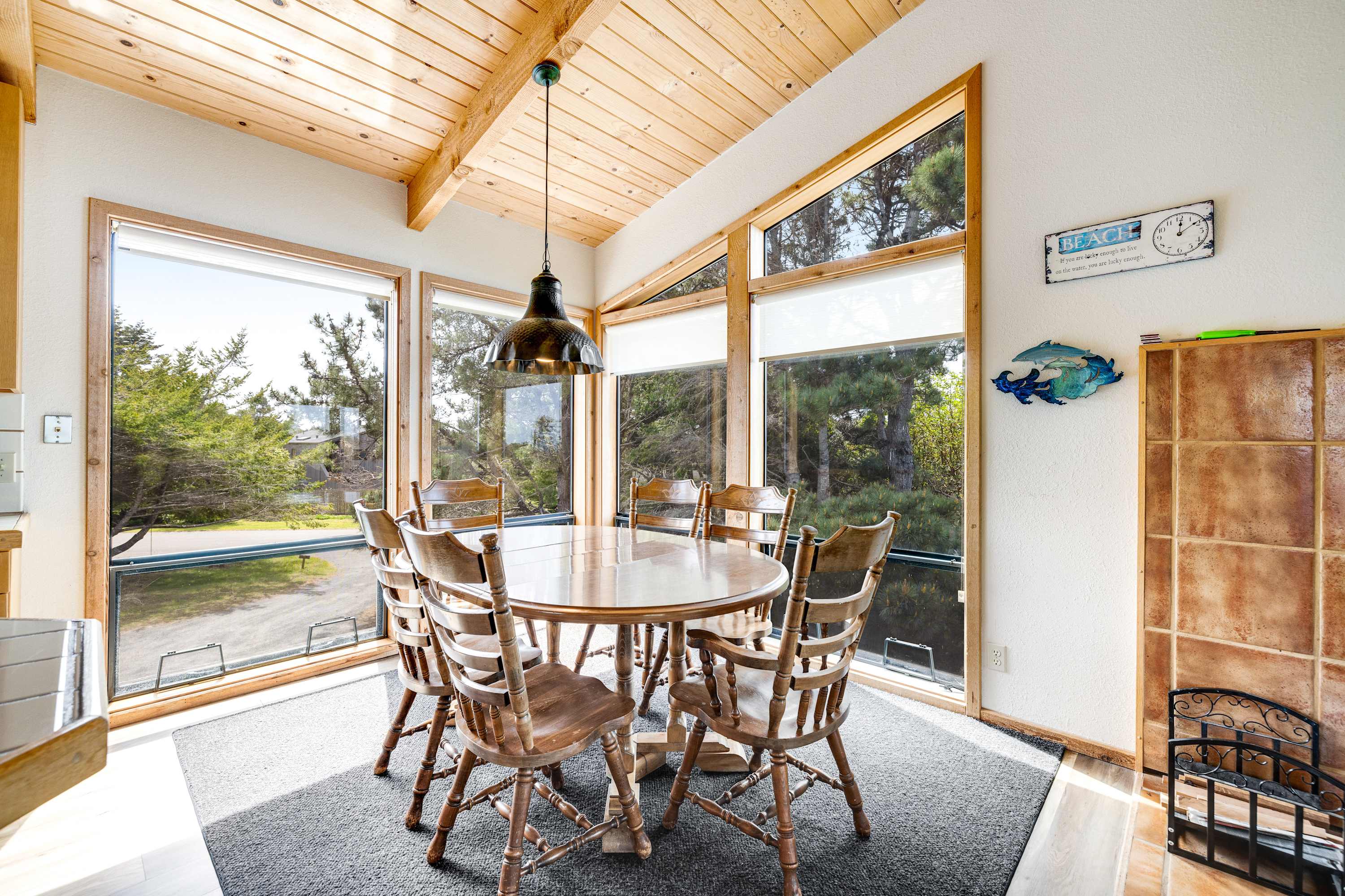 Gather around the dining table where meals become memories, surrounded by the beauty of nature just outside your windows.
