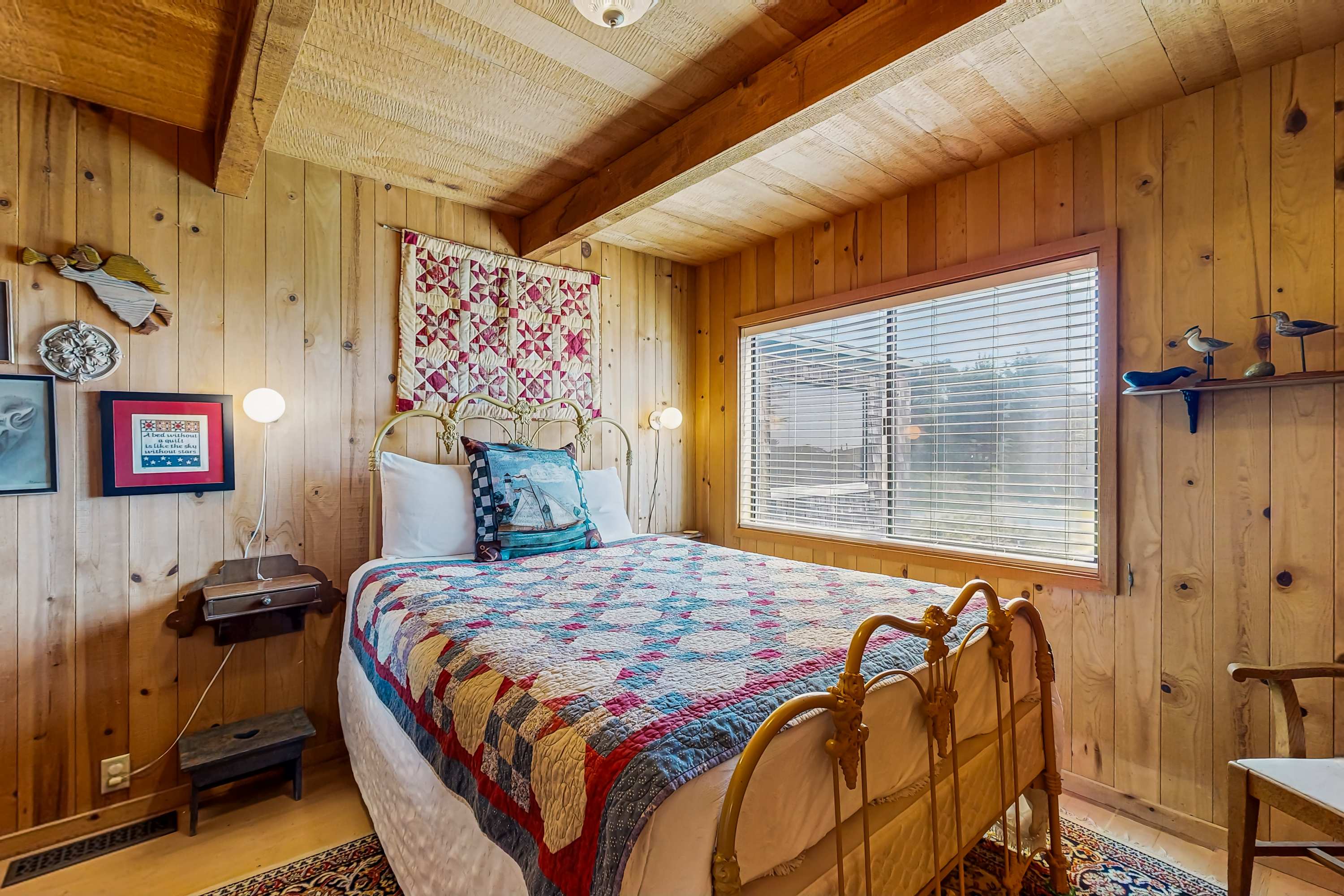 Retreat to the master bedroom, where rustic charm meets comfort, ensuring restful nights after your daily explorations.