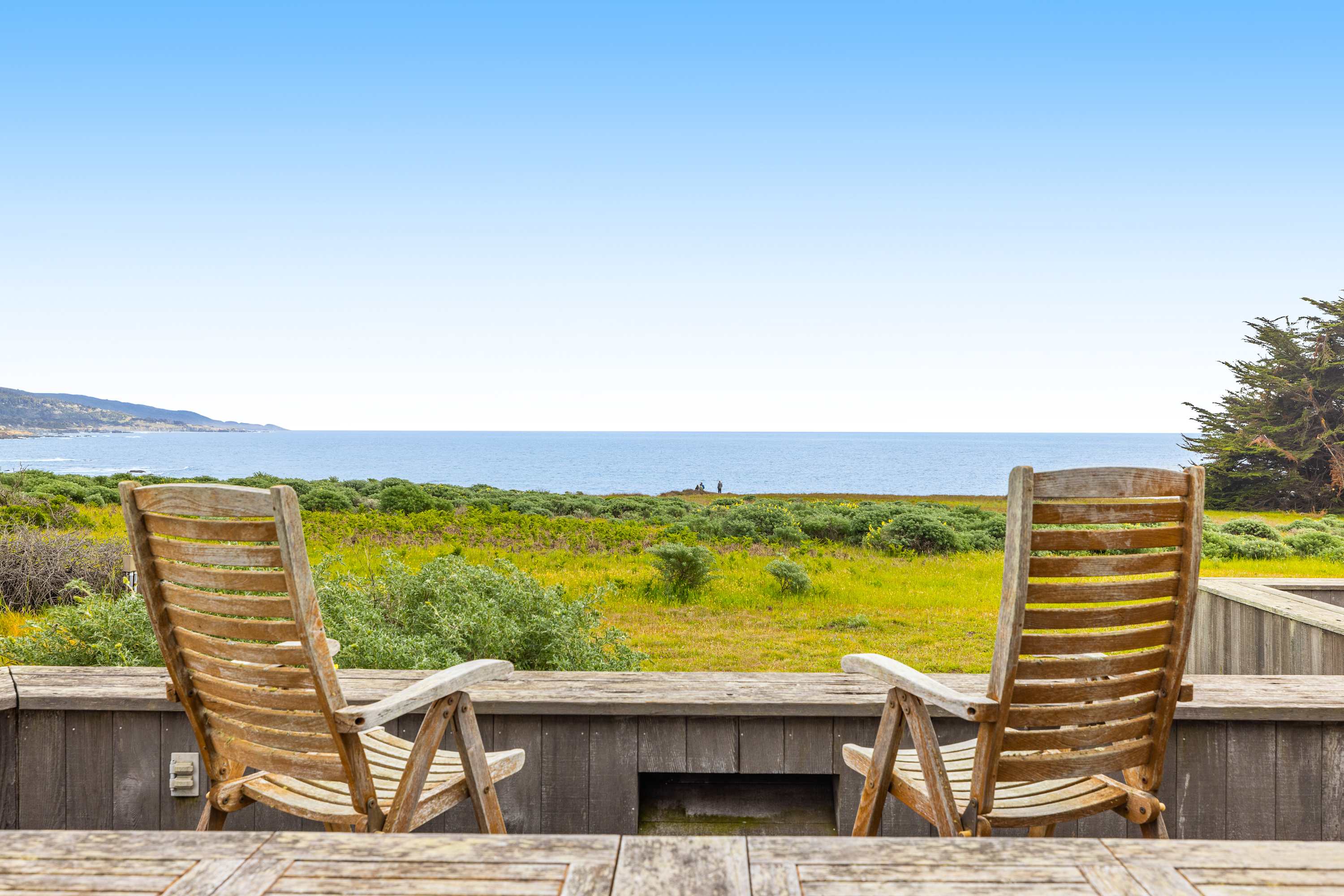 Take a moment to savor the scenery from your private deck, where tranquility and stunning ocean views create an idyllic setting.