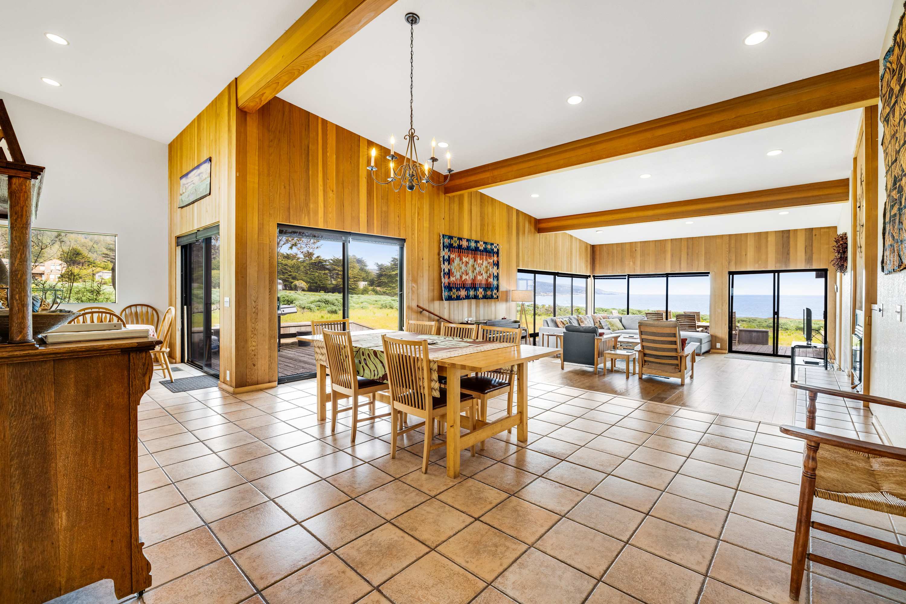 Enjoy meals with a view in this spacious dining area, where the beauty of the coastal landscape enhances every gathering.