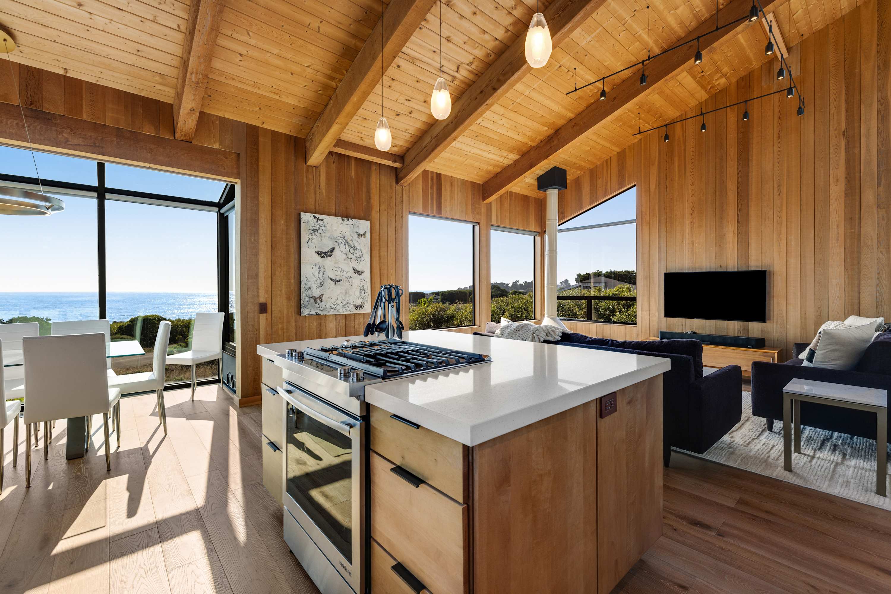 Appreciate the seamless flow between cooking and entertaining in this bright kitchen, where every meal can become a delightful event.