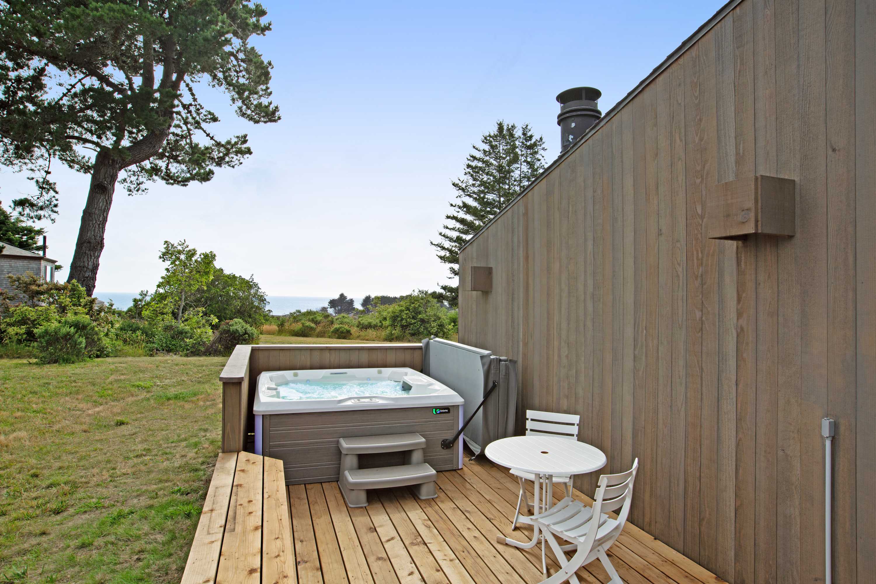 Step into your private hot tub and soak in the tranquility, surrounded by nature and ocean breezes.