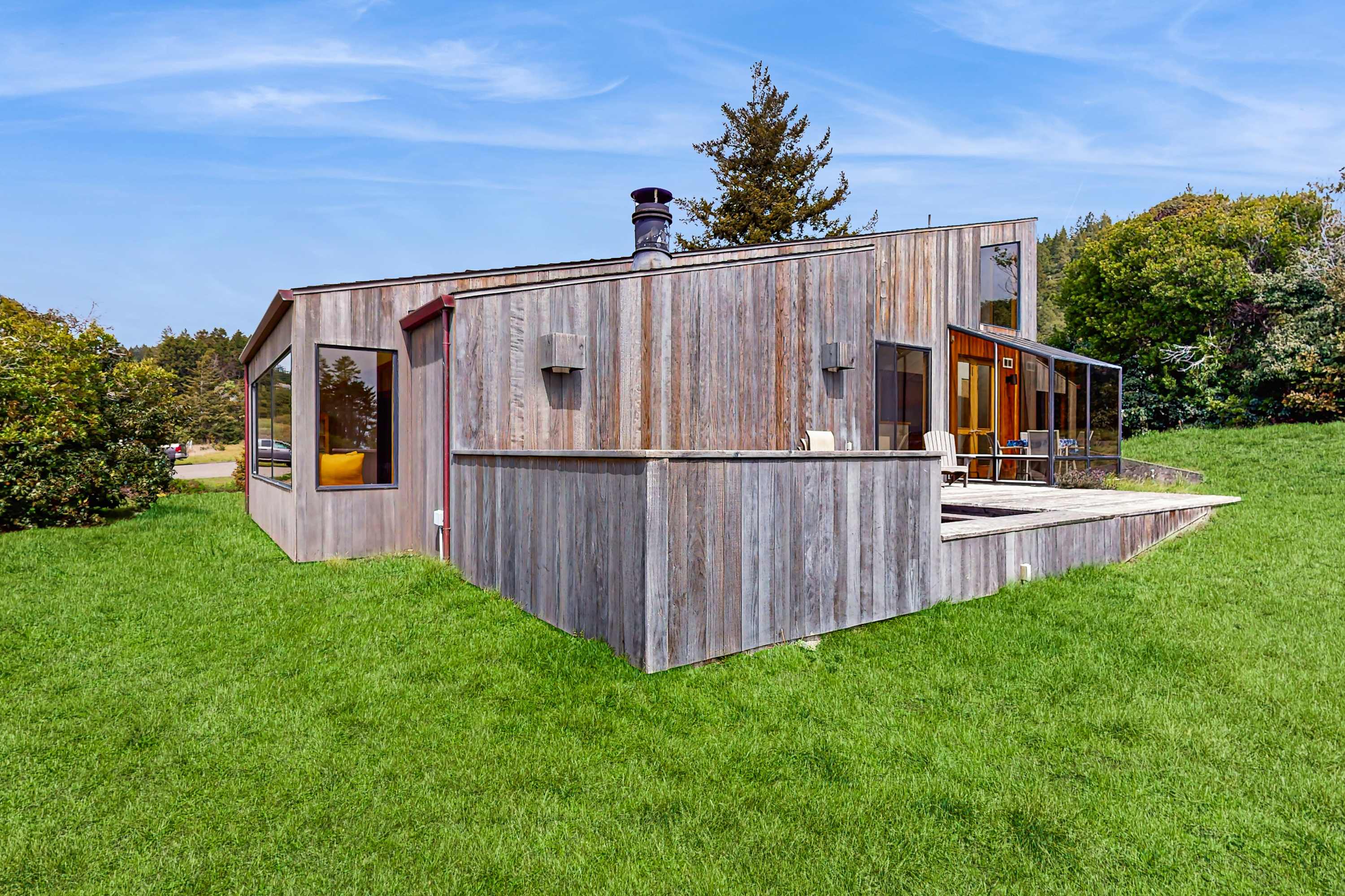 The charming exterior of your retreat hints at the cozy comforts within, nestled amidst the natural beauty of Sea Ranch.