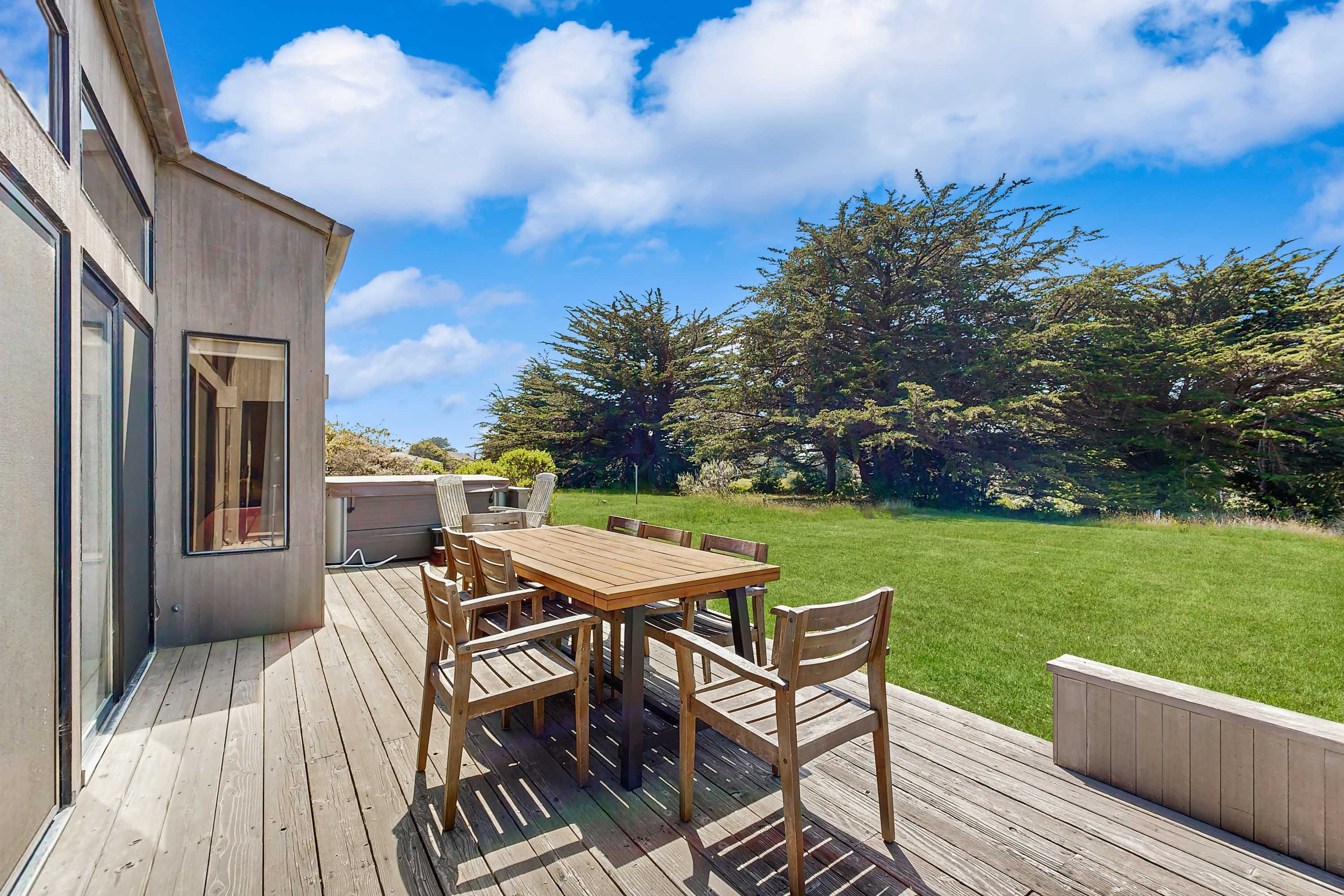 Step onto the deck for al fresco dining or morning coffee, surrounded by lush greenery for a refreshing start to your day.