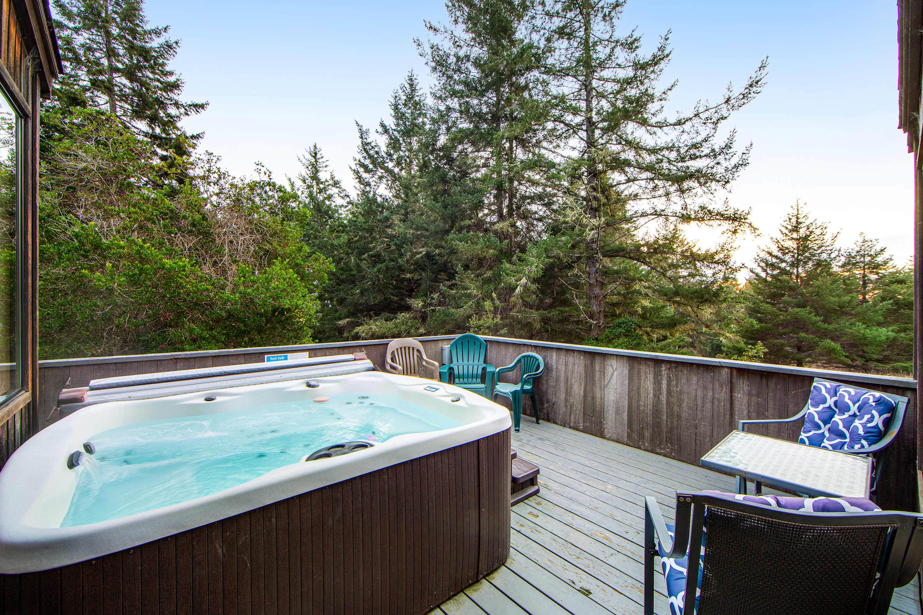 Soak under the stars in your private hot tub, surrounded by the serene sounds of nature, perfect for unwinding after a day of adventure.