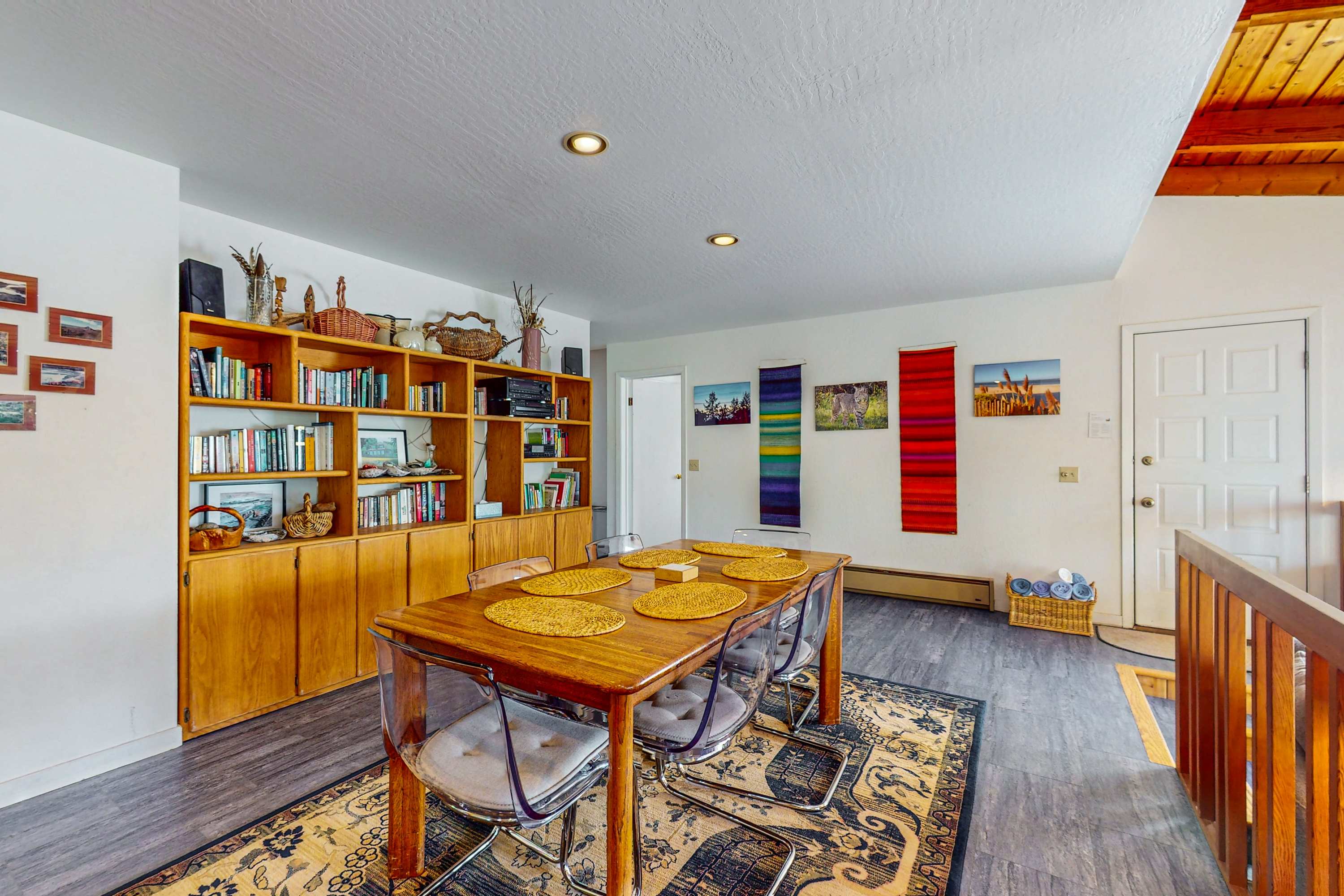 Share meals and stories around the dining table, designed for laughter and connection, with easy access to the lovely living area.