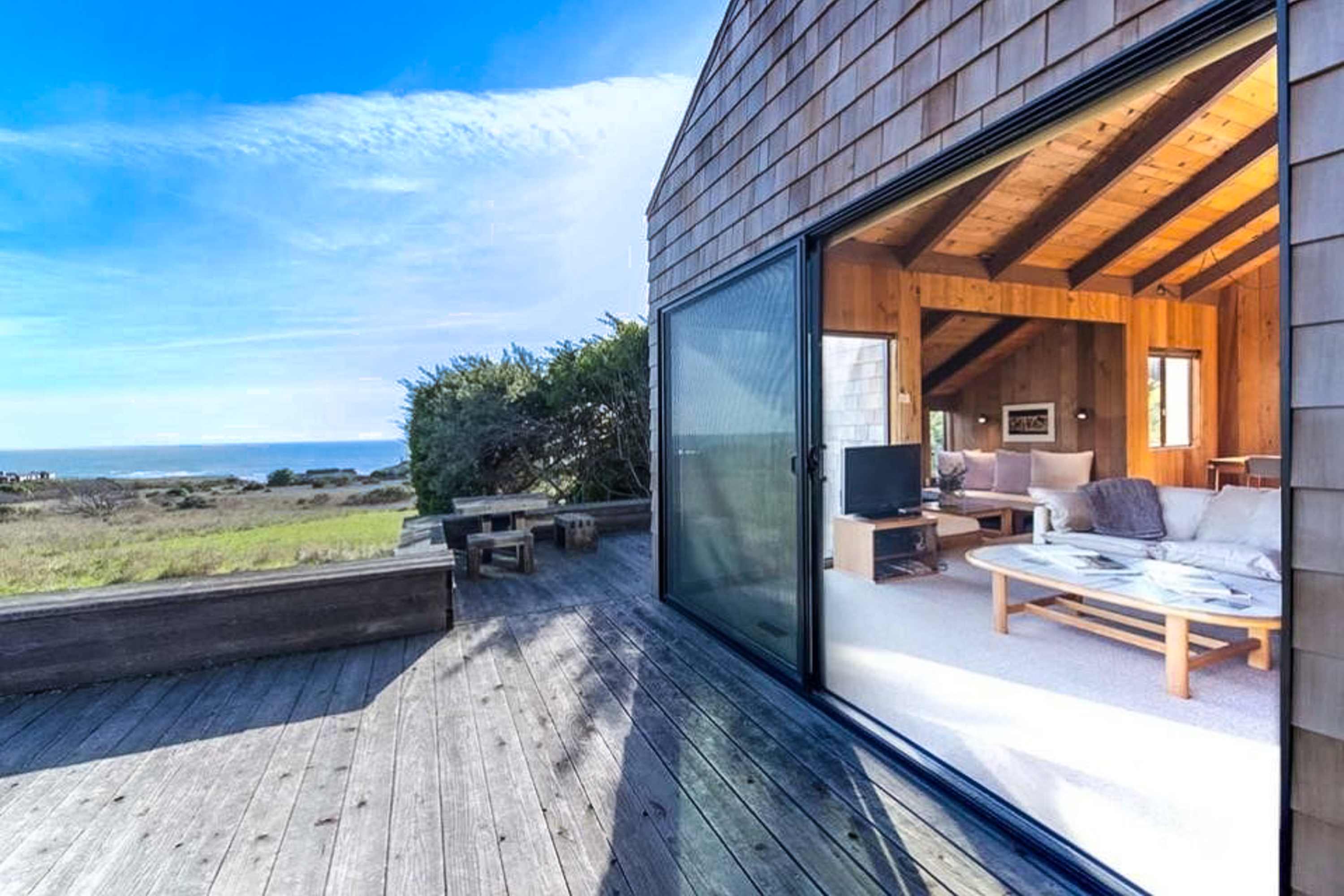 Step outside to the deck and breathe in the fresh coastal air, where stunning ocean views set the scene for unforgettable moments.