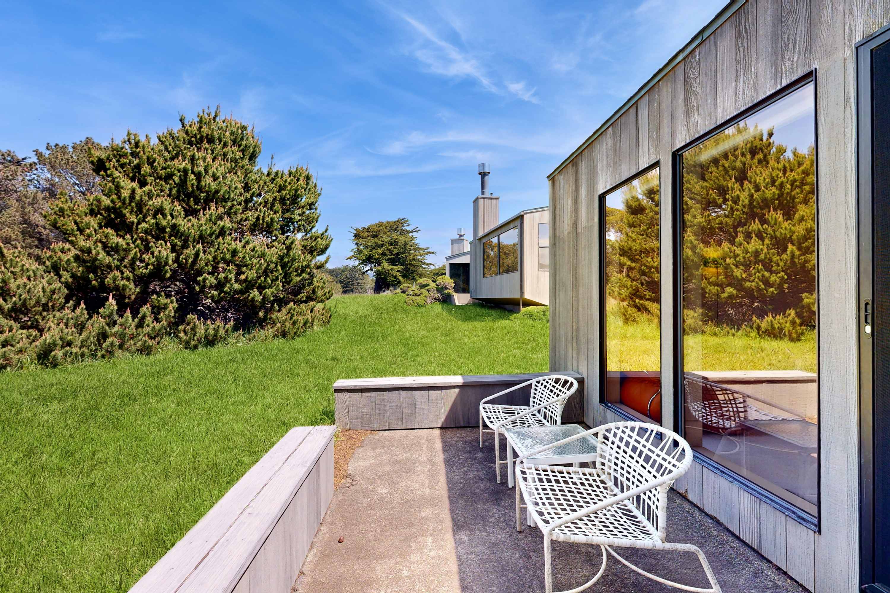 Soak in the sun on the outdoor deck, where you can enjoy the peaceful ambiance of your coastal escape.