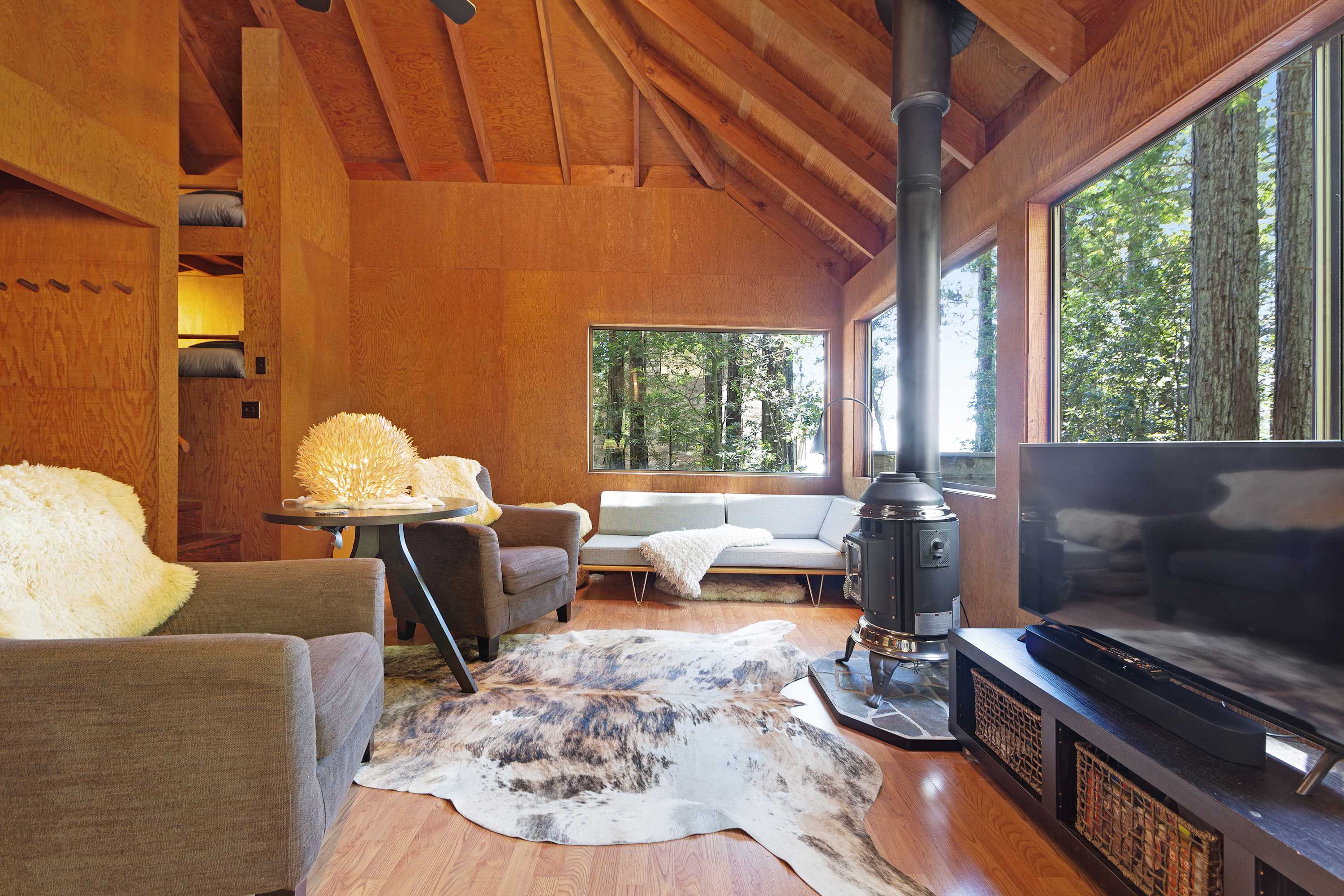 The warm glow of the gas fireplace creates a cozy atmosphere in the living room, inviting you to curl up with a good book or share stories with loved ones.