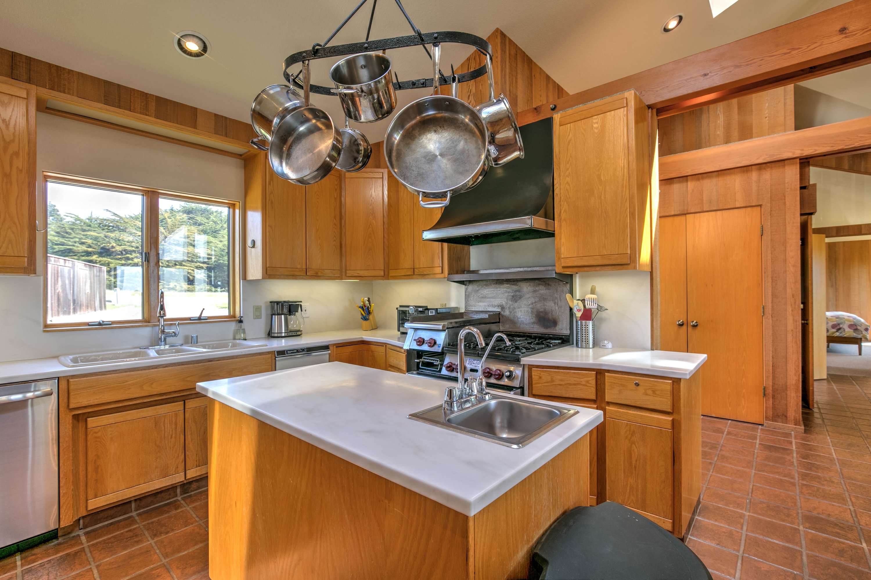 This functional kitchen combines style and convenience, making meal prep a breeze for your beachside getaway.