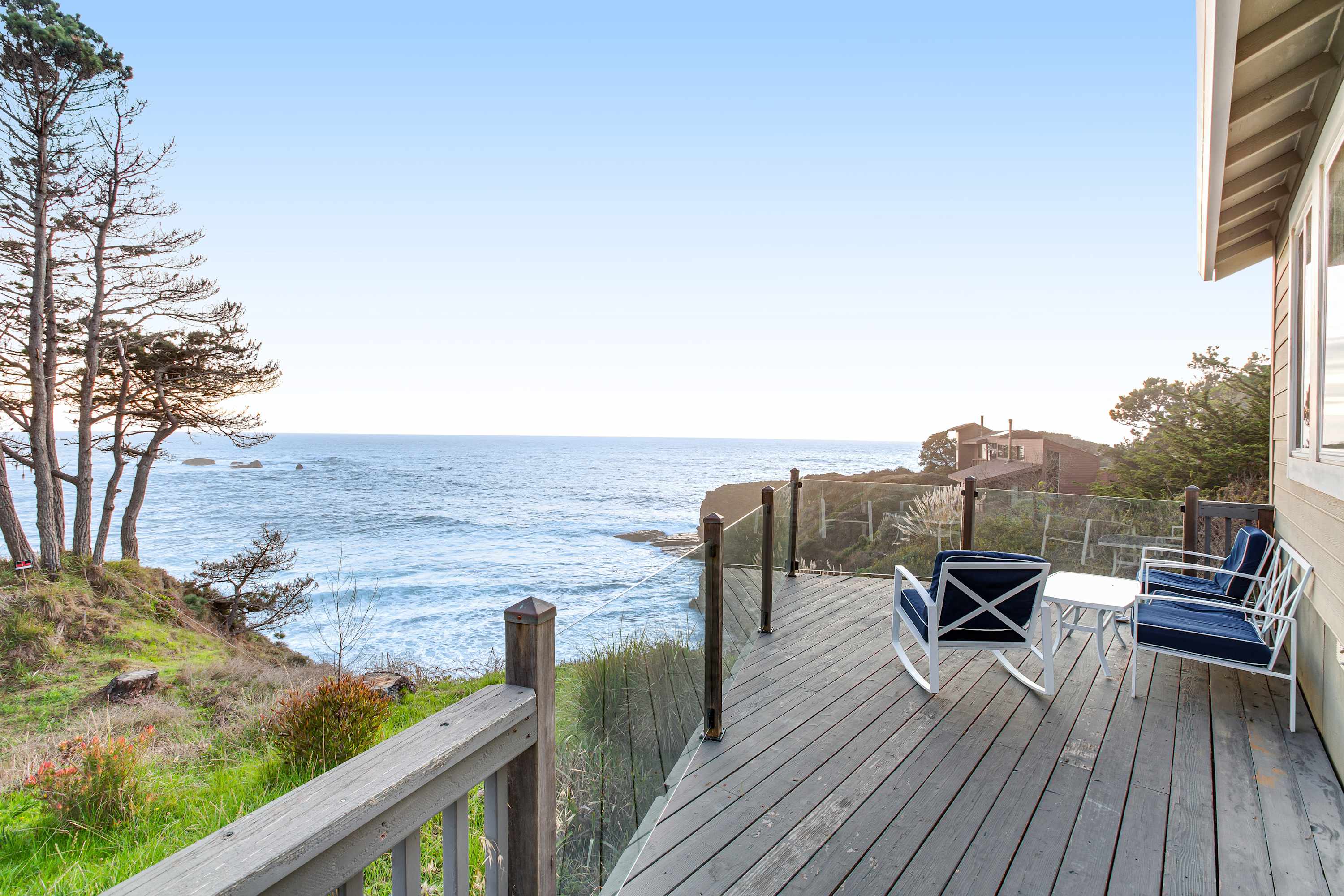 Breathe in the salty air from your private deck, where expansive ocean views set the stage for peaceful mornings and sunset reflections.