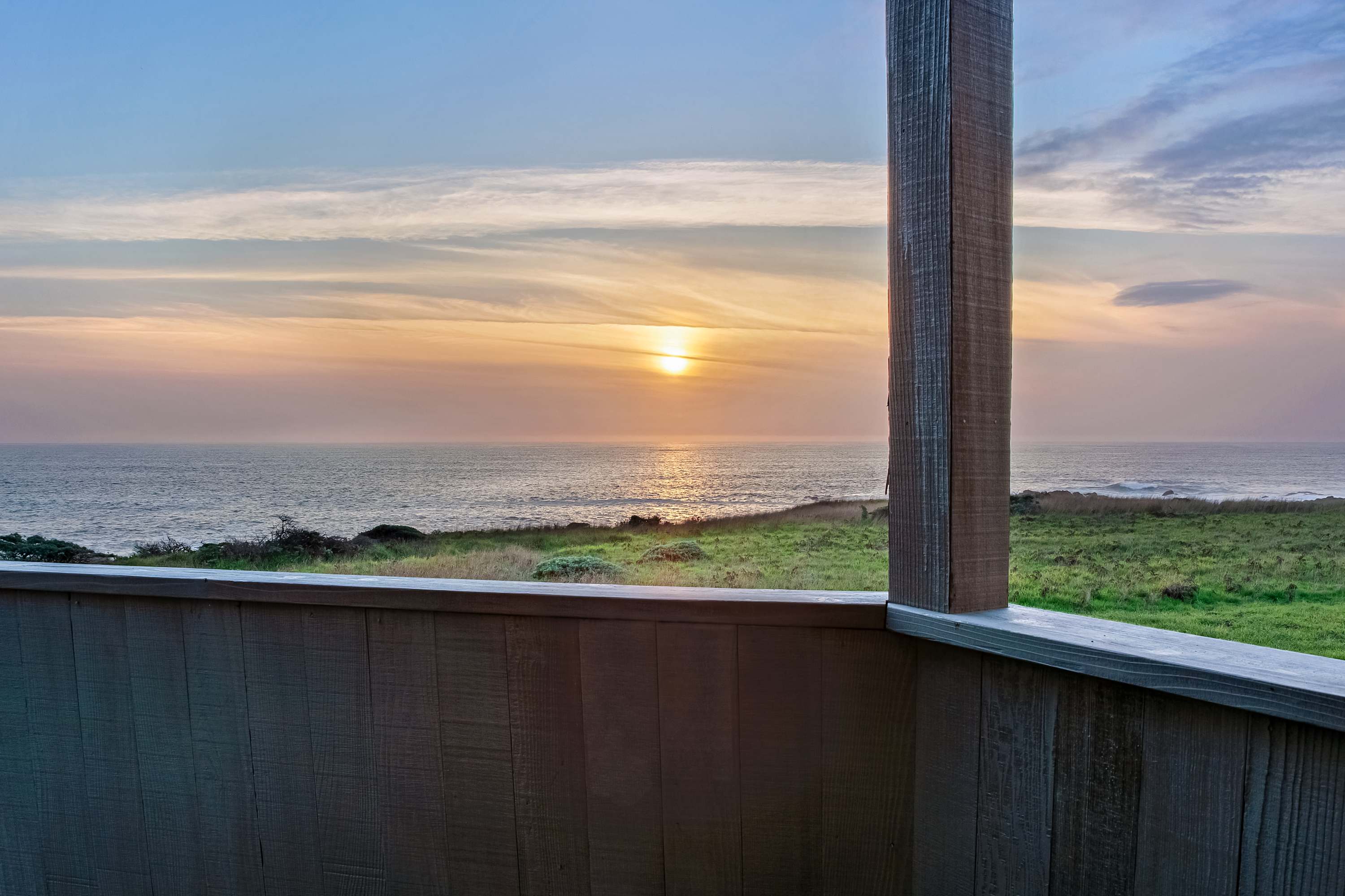 Breathe in the fresh ocean air as you soak in the sweeping views from your deck, a perfect spot for sunset reflections.