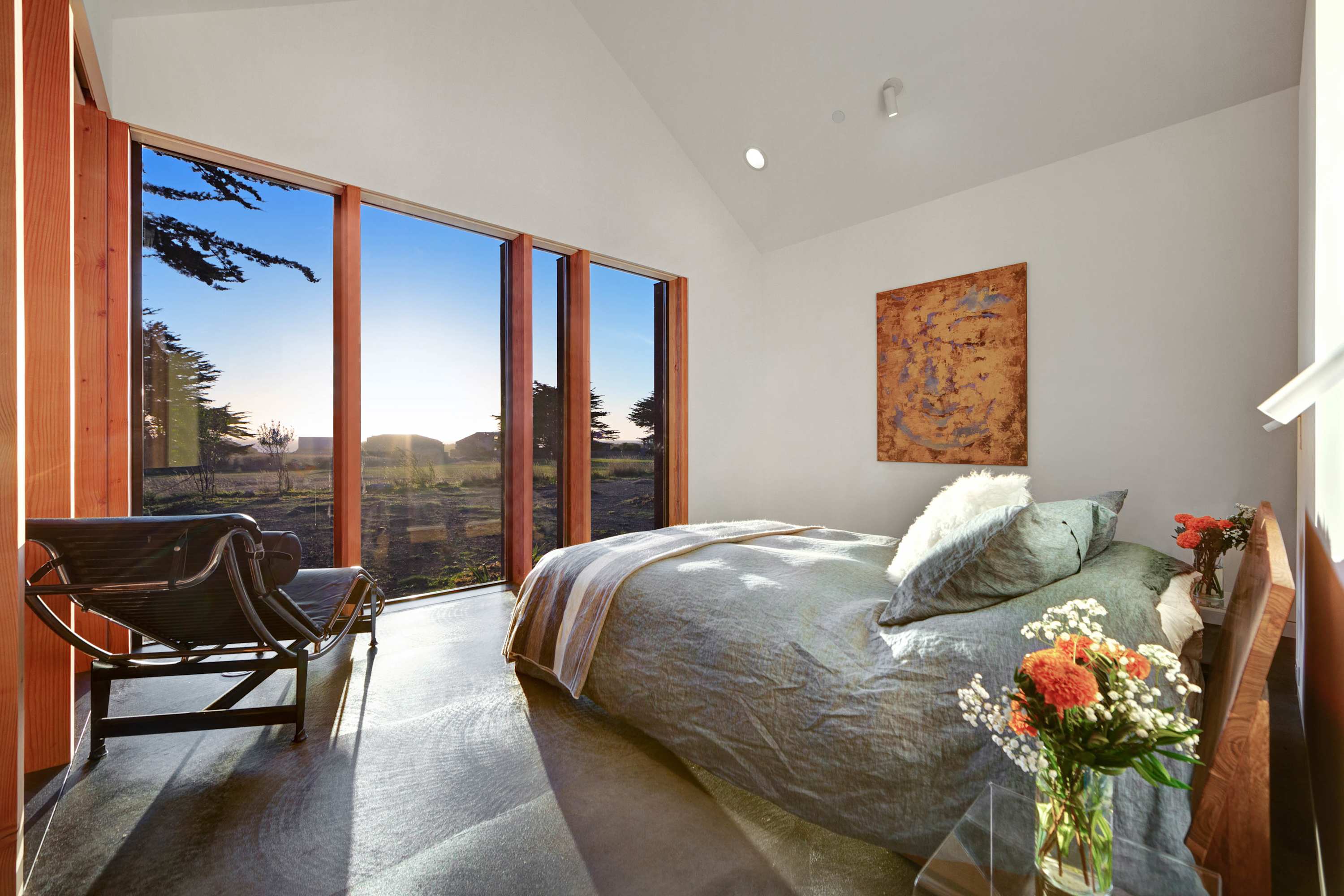 Wake up to breathtaking ocean views in this tranquil master bedroom, your serene retreat after a day of exploration.