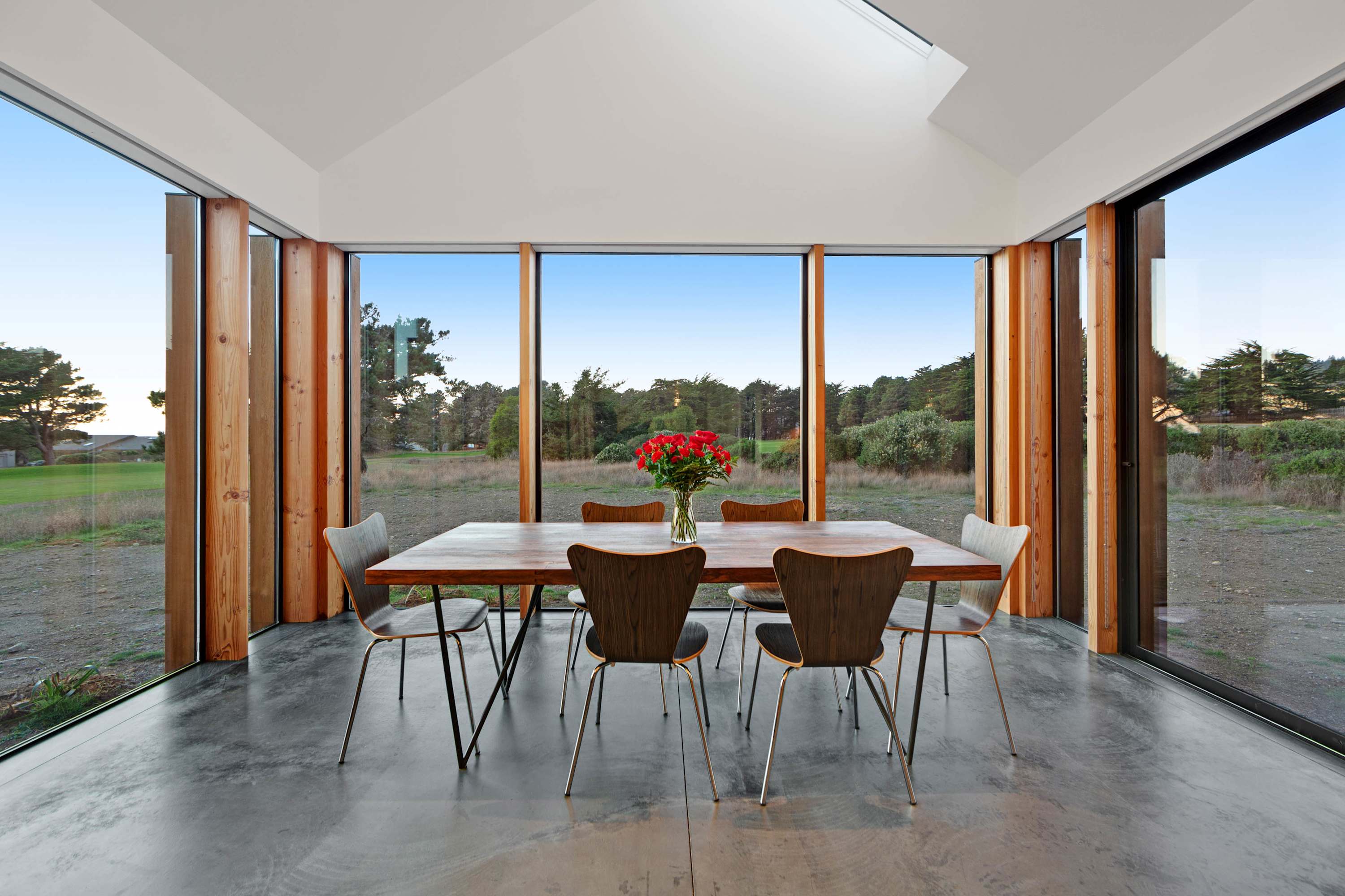 Imagine sharing meals with loved ones at this dining table, surrounded by panoramic views that inspire conversation and laughter.