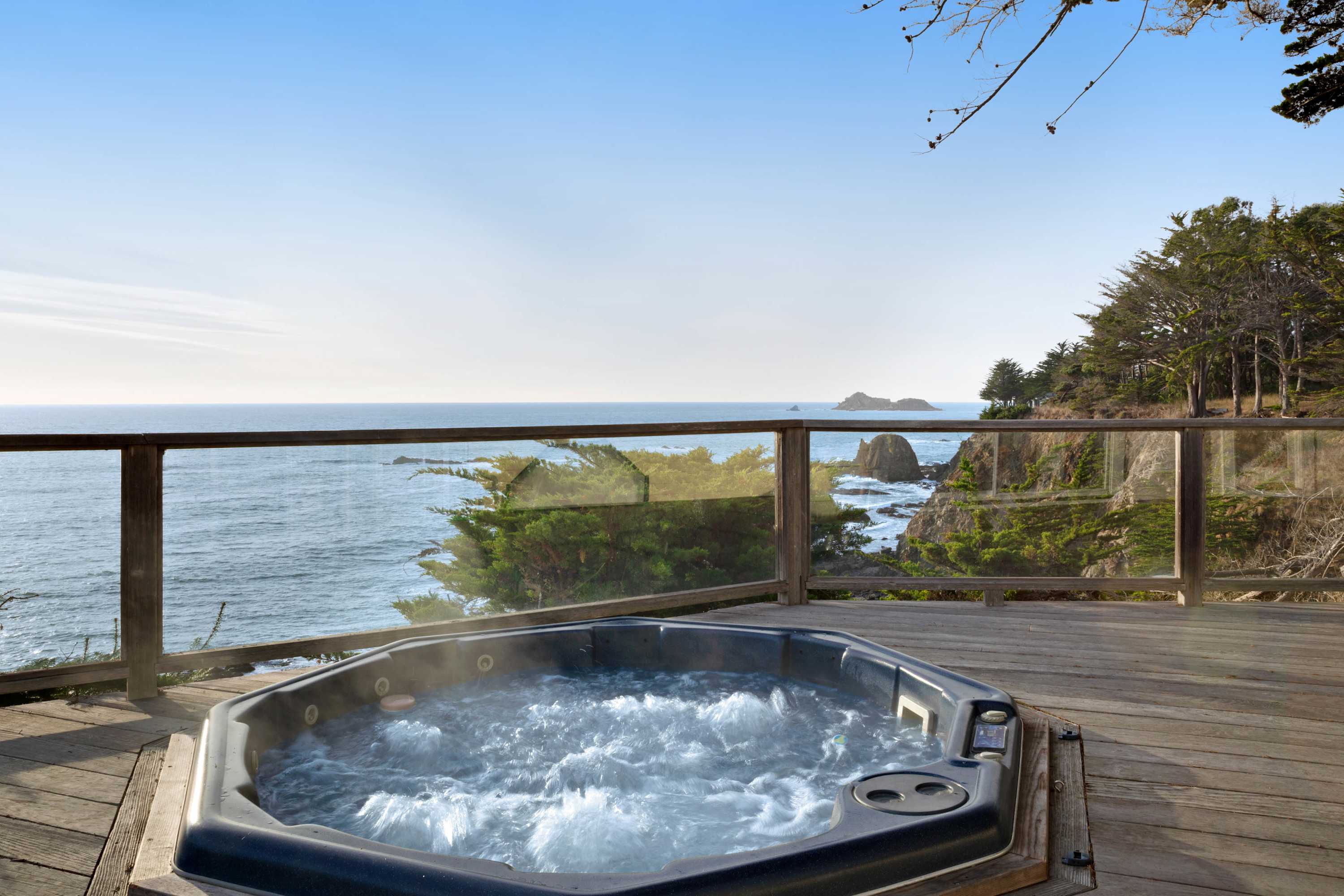 Soak in the hot tub under the stars, with the soothing sounds of the ocean waves just a heartbeat away.
