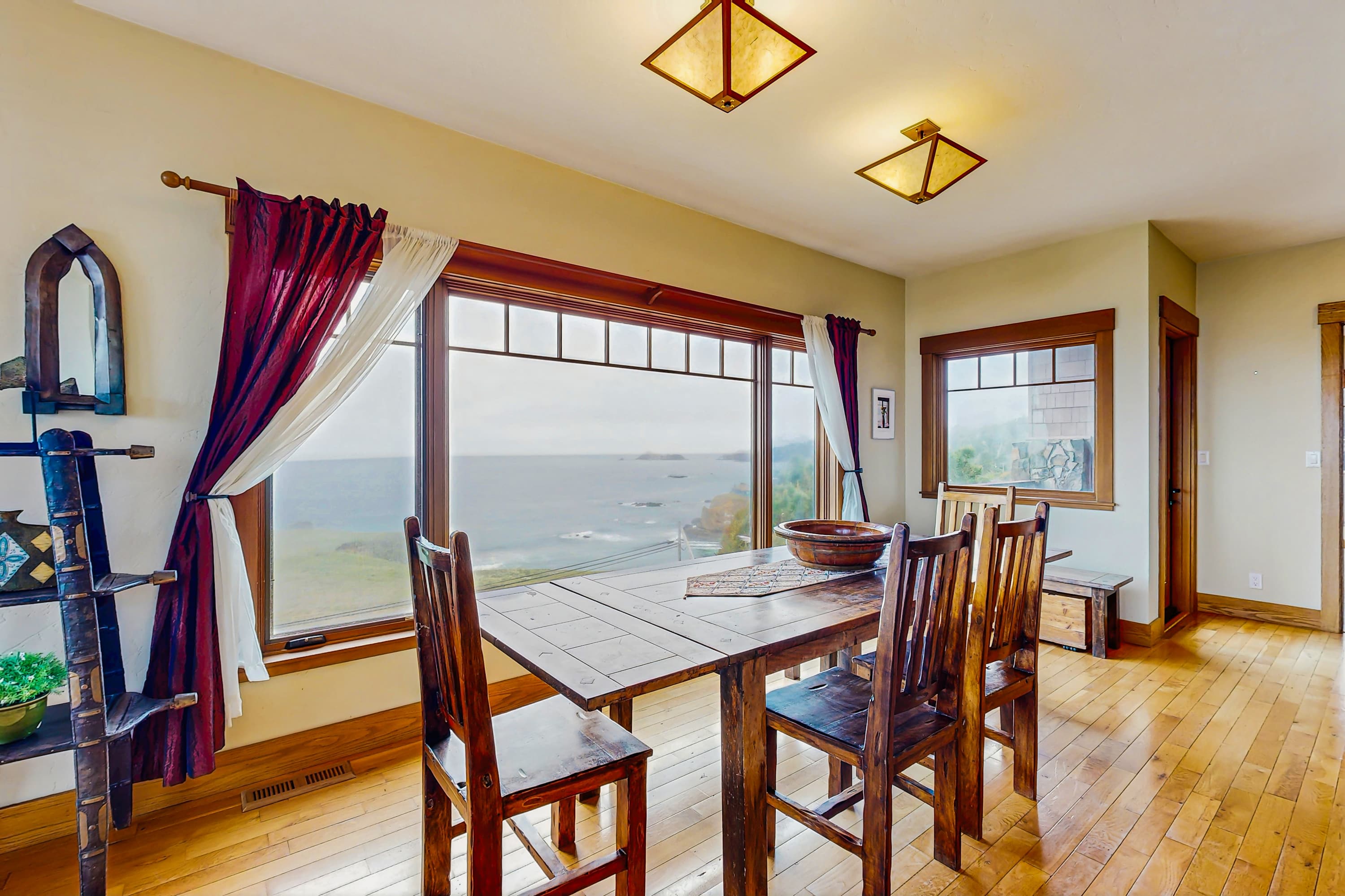 Dine with a view in this charming dining area, where the ocean backdrop adds a special touch to every meal shared with loved ones.