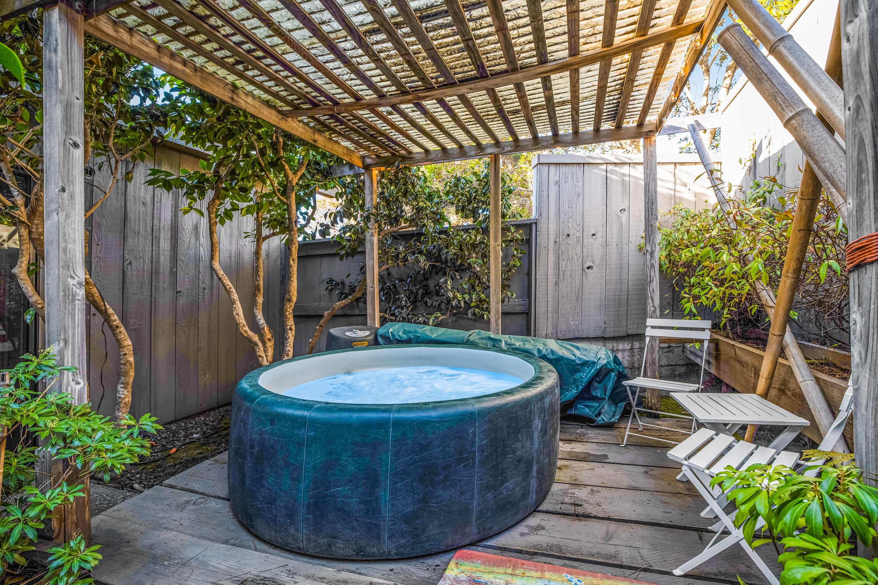 Soak in the private hot tub under the stars, letting the soothing warmth wash away your cares after a day of adventure.