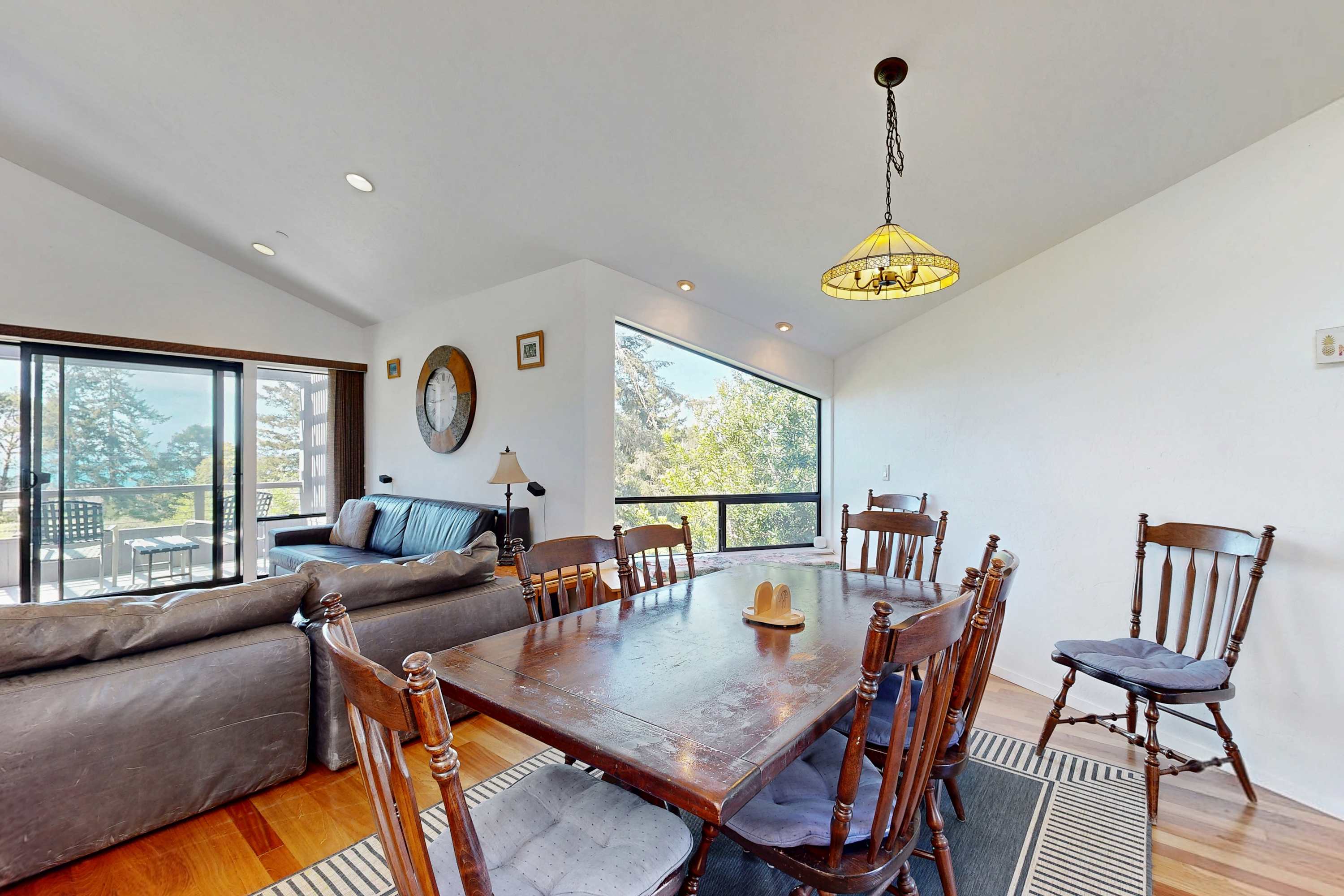 Share meals at this bright dining table, where you can engage in lively conversations while soaking in views of the serene surroundings.