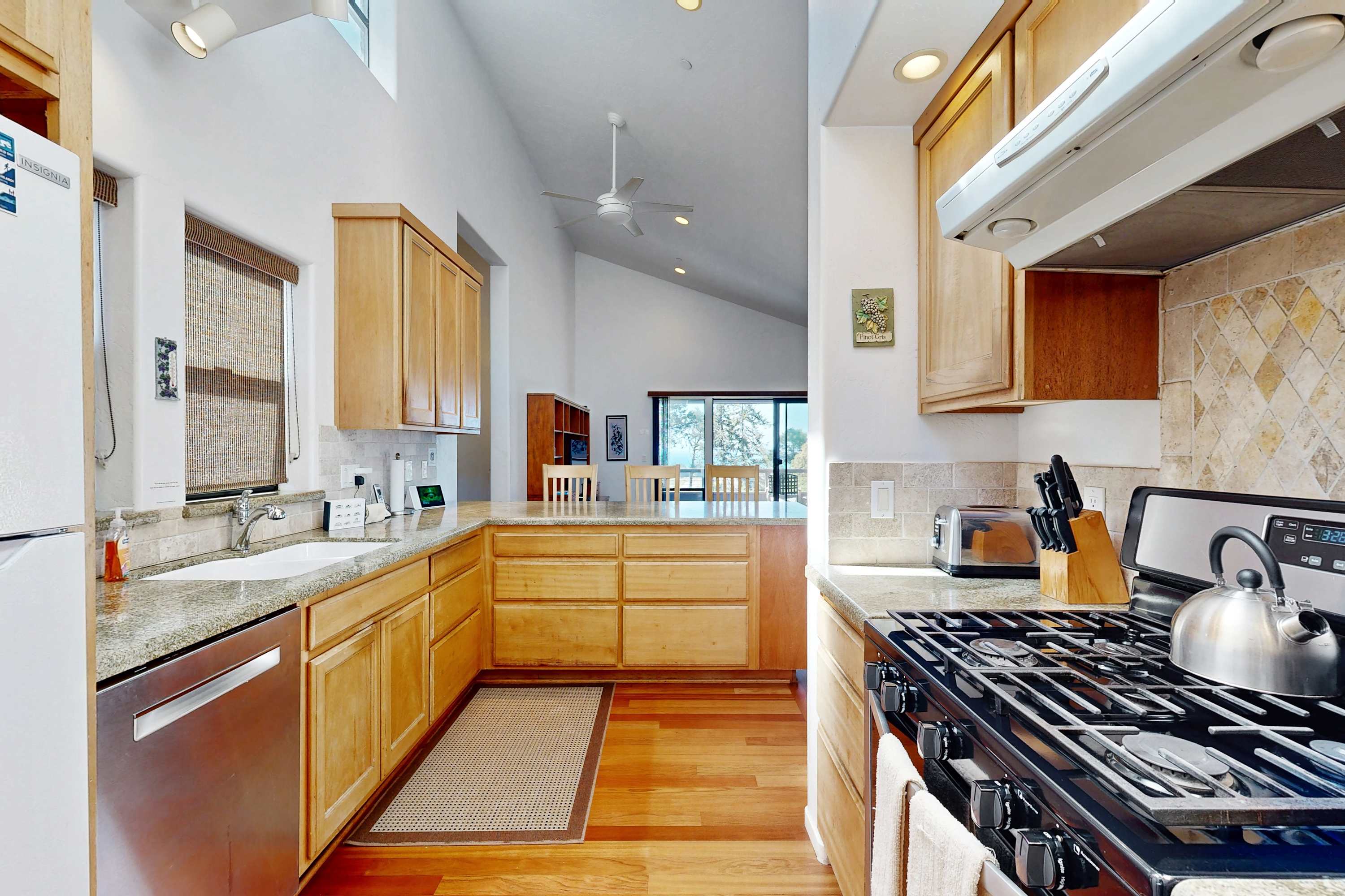 Create delicious meals in this bright kitchen, where open space and modern appliances inspire culinary adventures with family and friends.