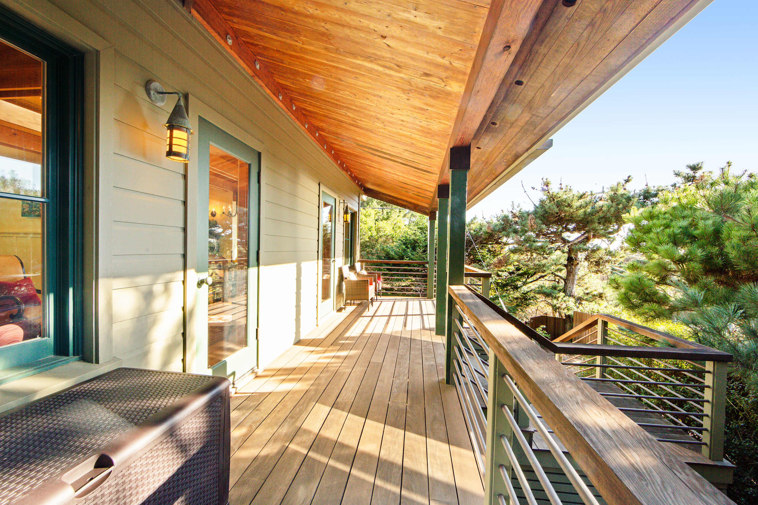 Step out onto the expansive deck, where you can savor ocean views and bask in the gentle coastal breeze while enjoying your morning coffee.