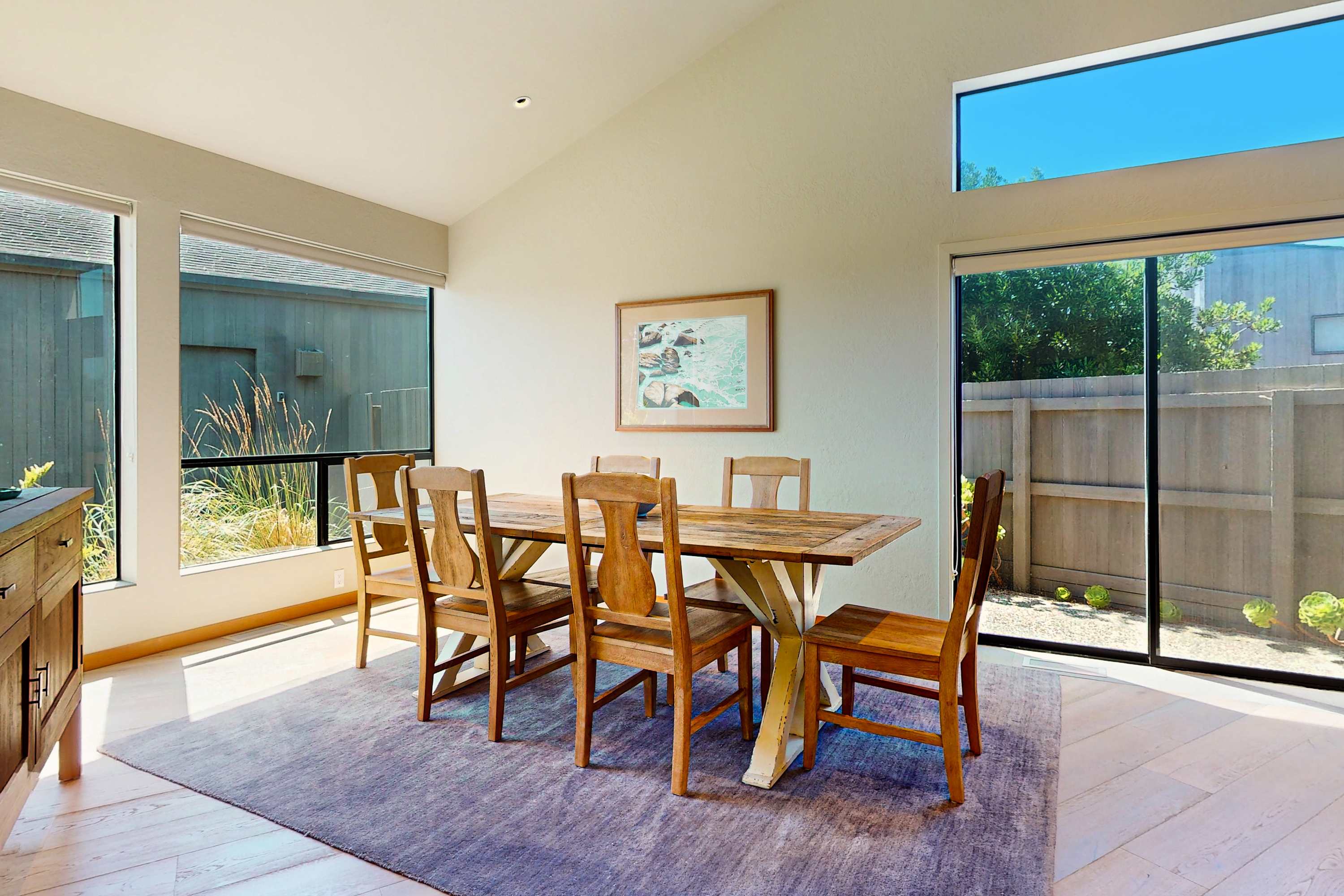 Share meals and create memories around this spacious dining table, where coastal charm meets modern elegance.