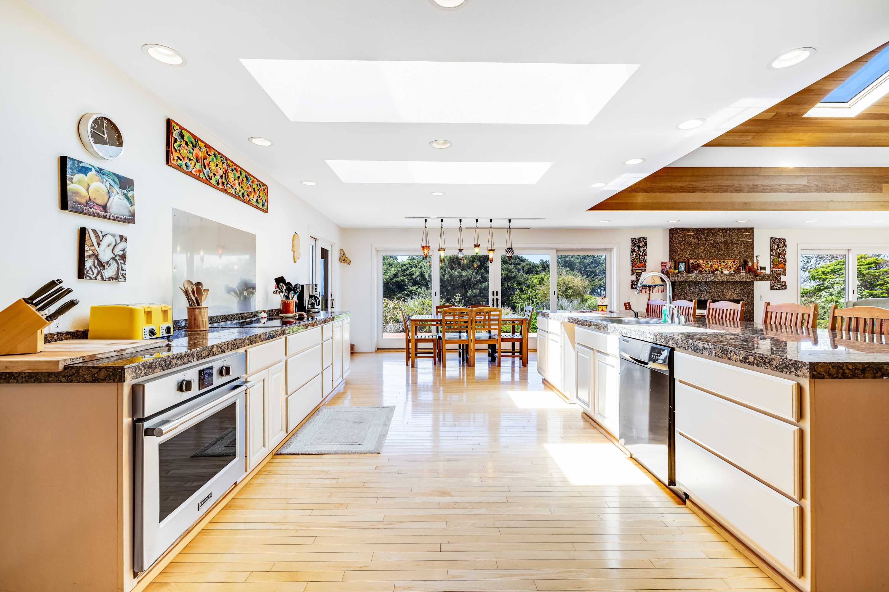 Experience the joy of meal prep in this bright kitchen, featuring ample counter space and a layout that encourages togetherness.