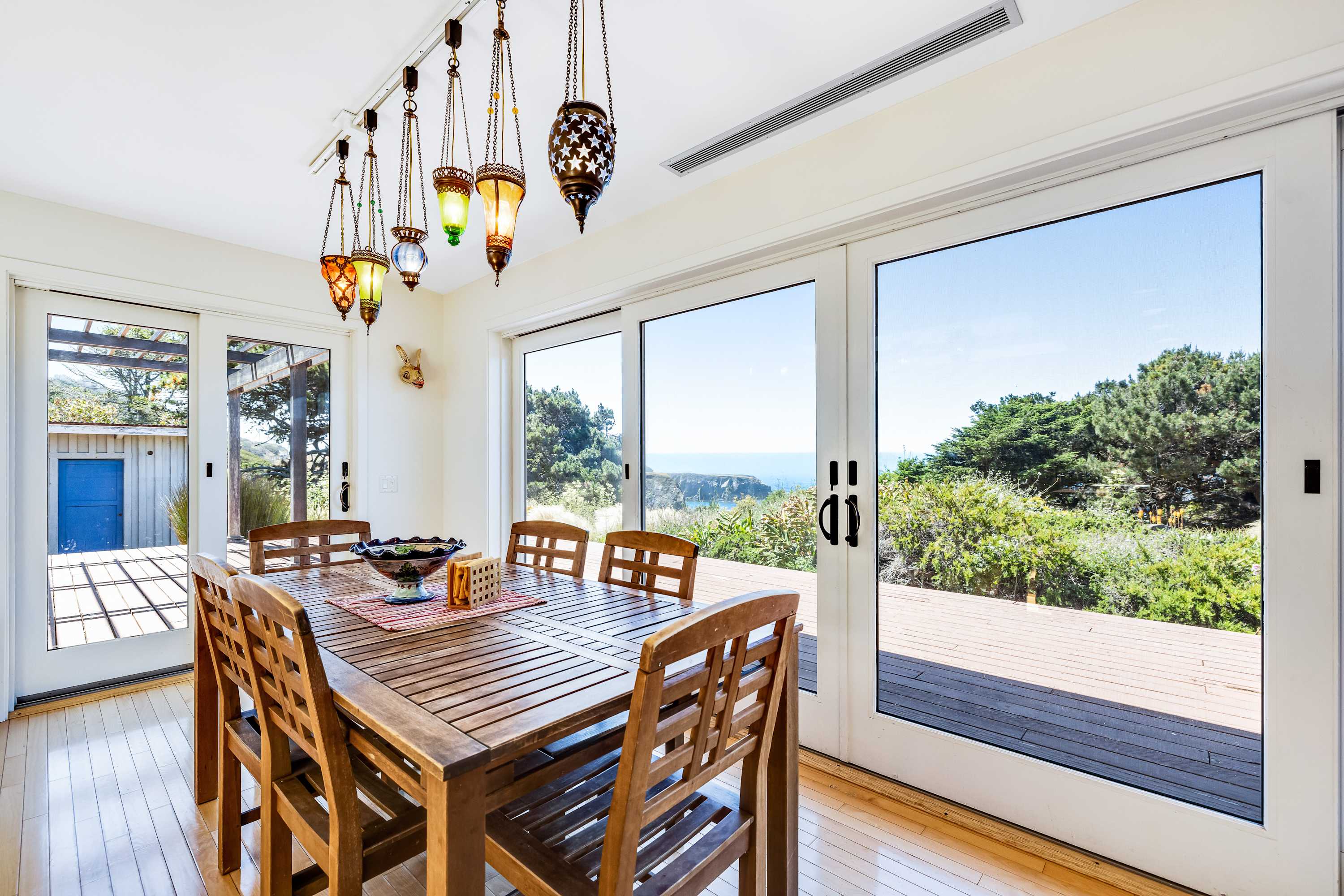 Picture yourself sipping morning coffee at this inviting dining space, where the serene atmosphere sets the stage for a relaxing day ahead.
