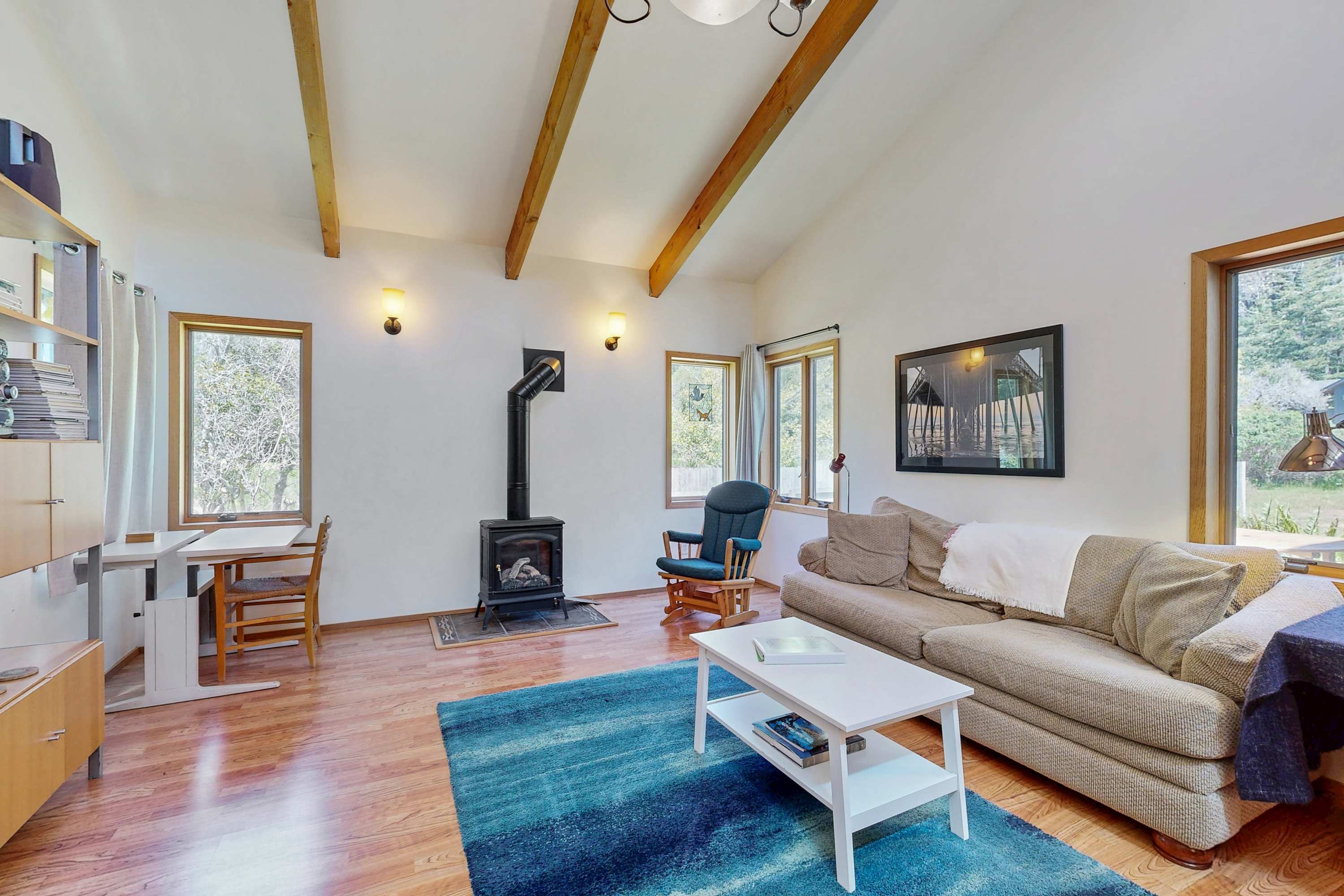 Morning light fills the cozy living room, where you can curl up by the gas fireplace with a good book or enjoy a movie night.