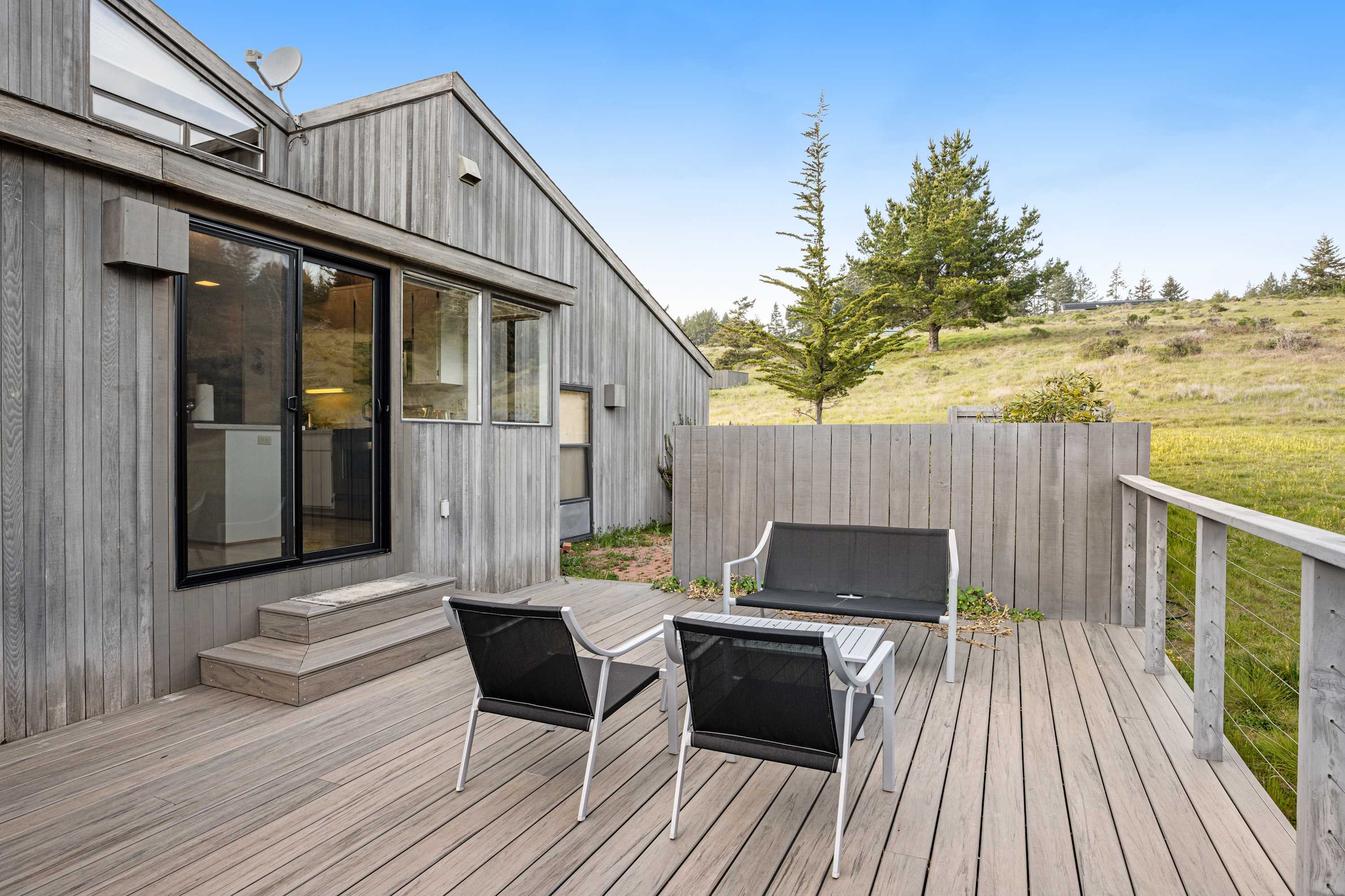 Step outside to your private deck, the perfect spot for morning coffee as you embrace the tranquility of nature.