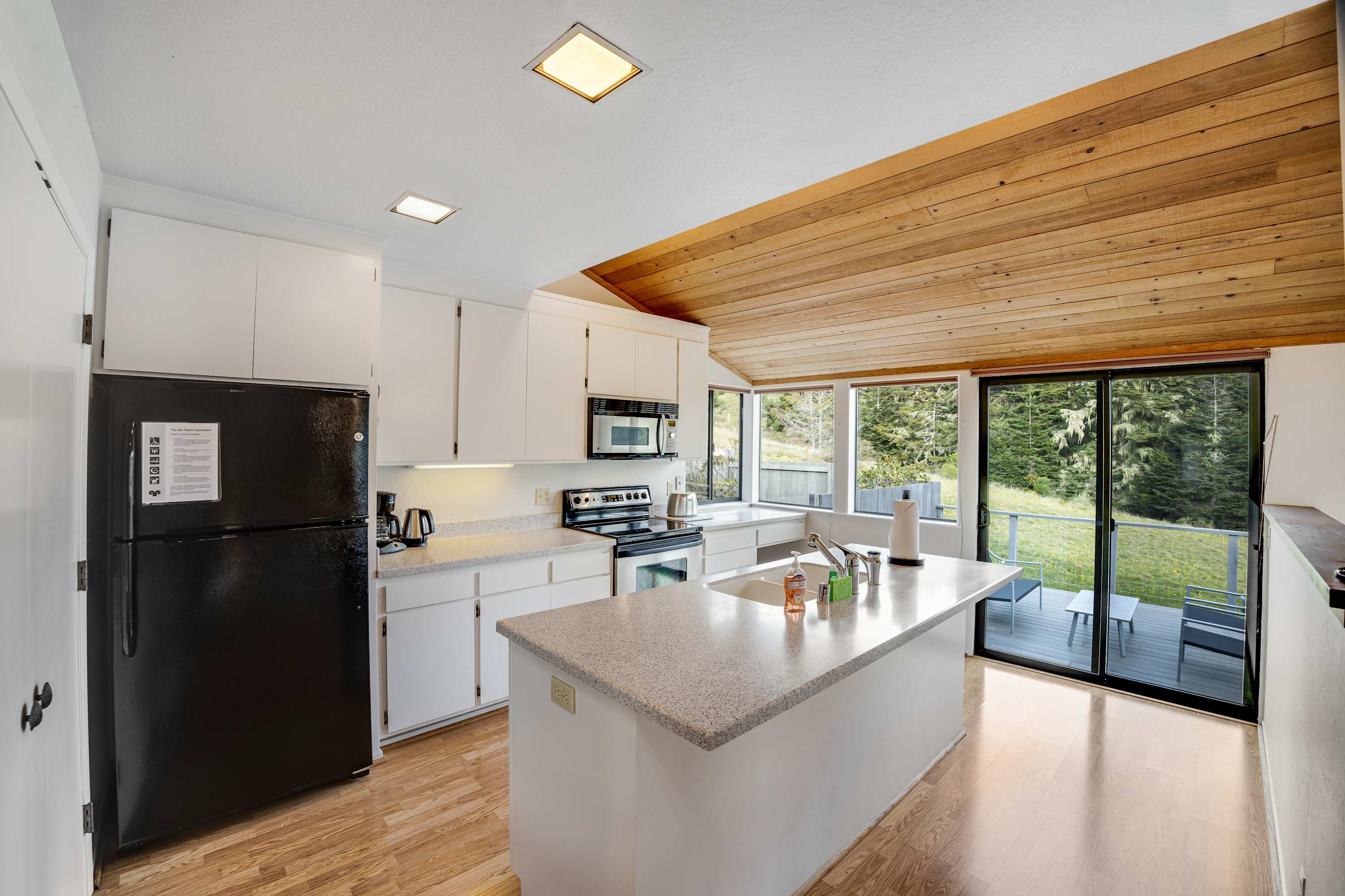 Cook up coastal-inspired meals in a well-equipped kitchen, with views that inspire culinary creativity.