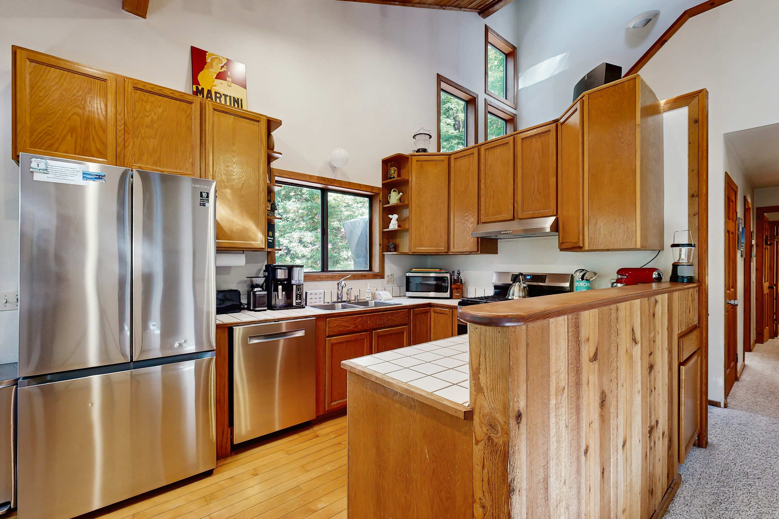 Your culinary adventures begin in this spacious kitchen, equipped to inspire your inner chef with modern conveniences.