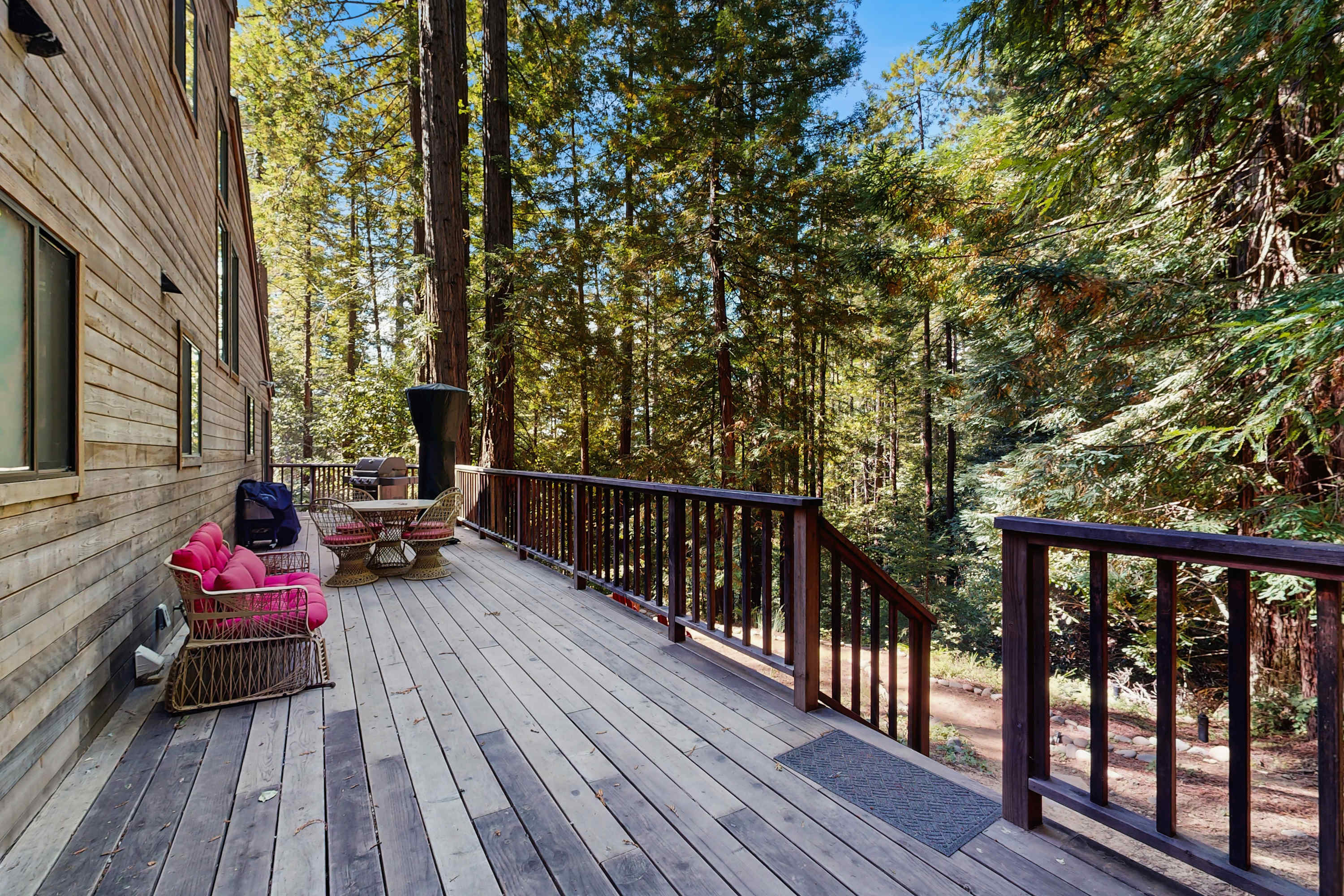 Step onto your expansive deck, where morning coffee meets the whisper of the trees, and evenings are perfect for stargazing.