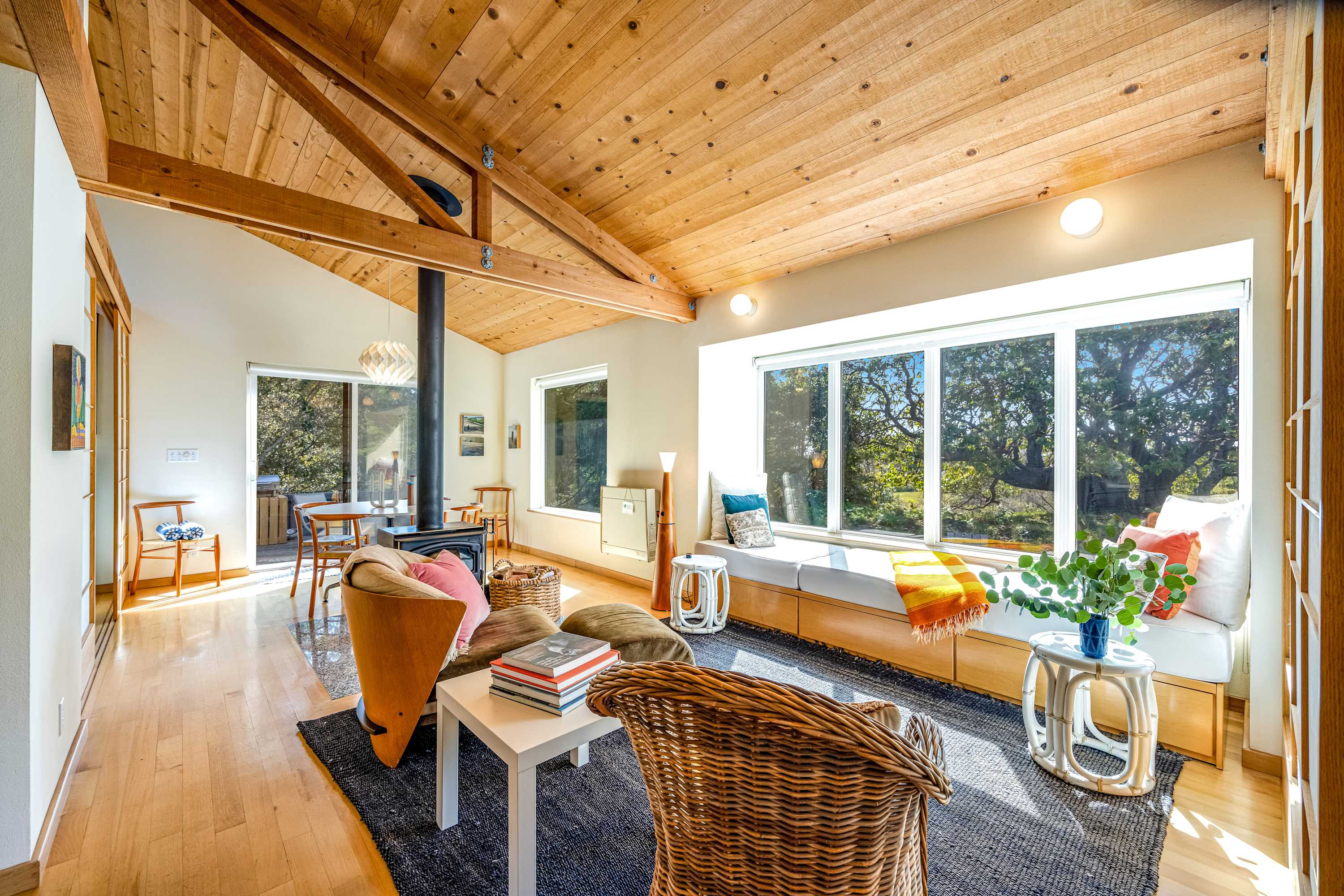 Bask in the warm glow of sunlight streaming through the large windows, creating a perfect backdrop for your afternoon relaxation.