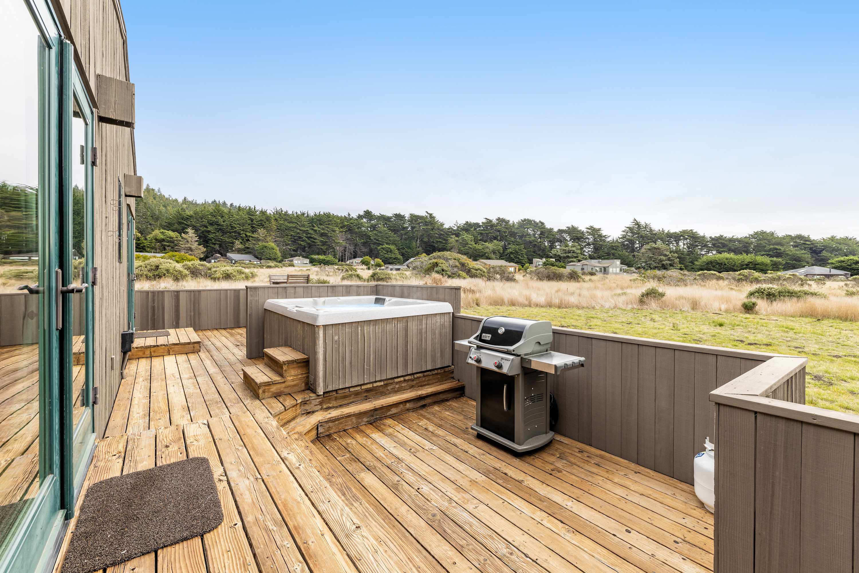 Step onto the expansive deck, where you can grill up a feast and soak in the stunning landscape that surrounds you.