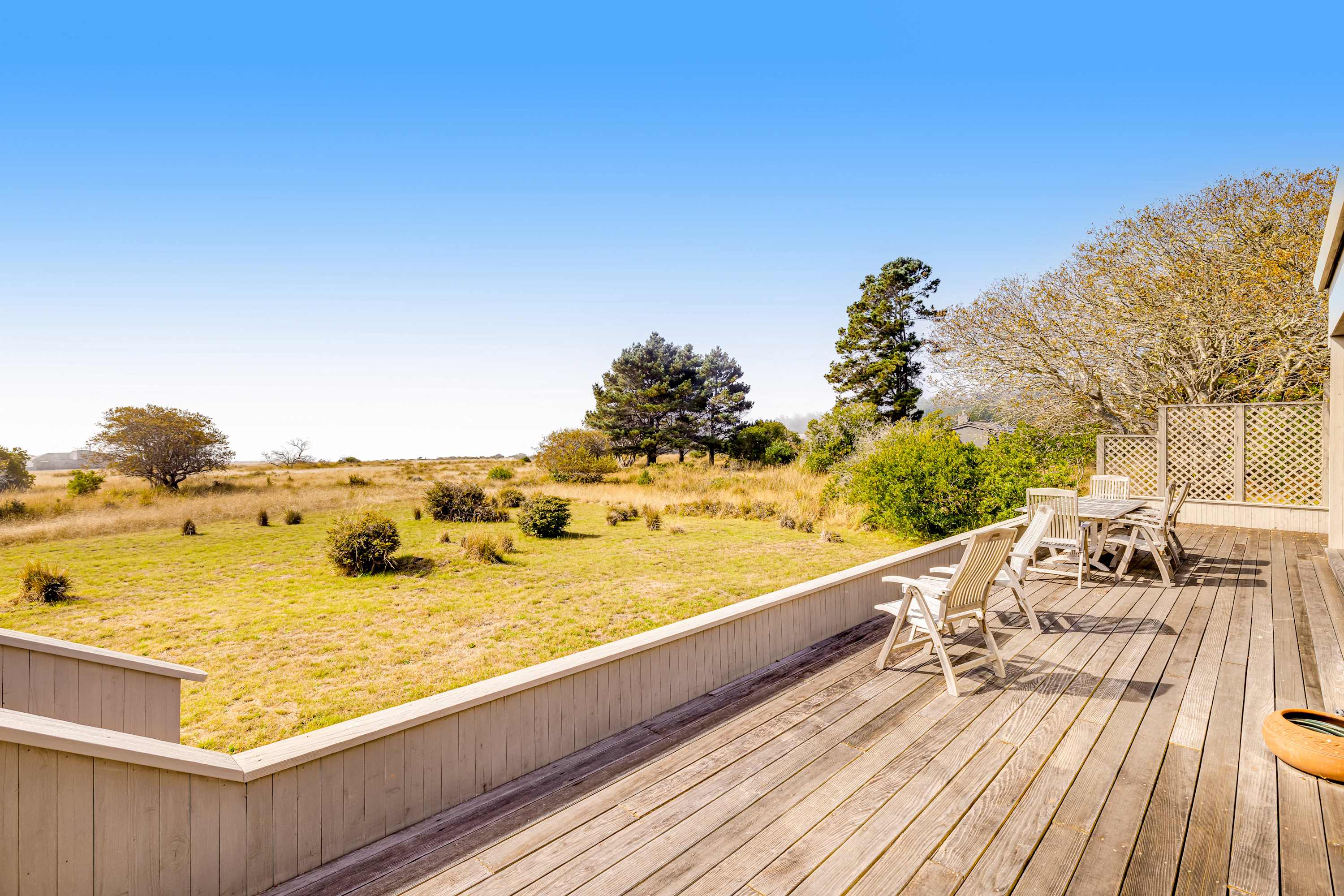 Enjoy quiet moments on the deck, where gentle coastal breezes and open skies create the ideal backdrop for relaxation.