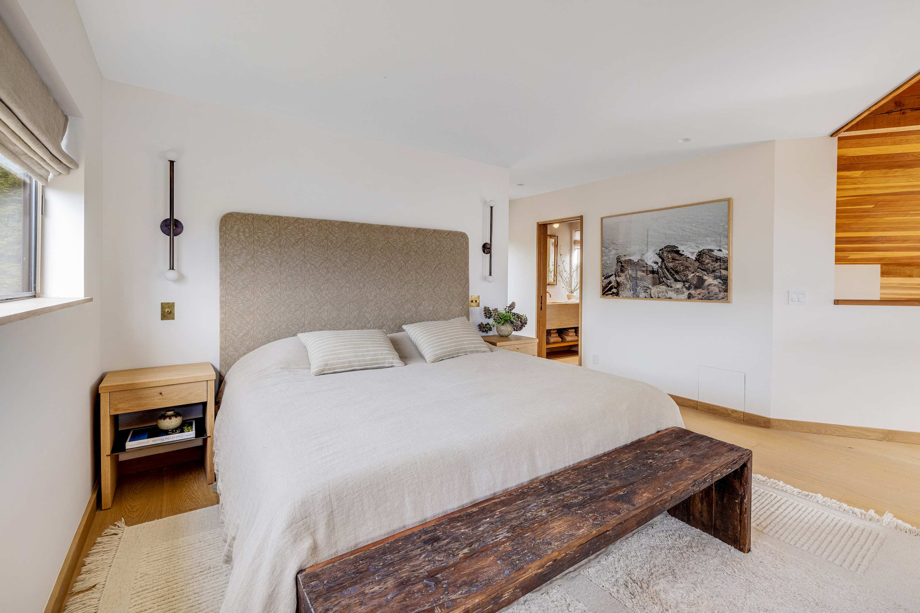 Find comfort in this stylish master suite, where modern design meets cozy touches, making it a perfect retreat after a day of exploration.