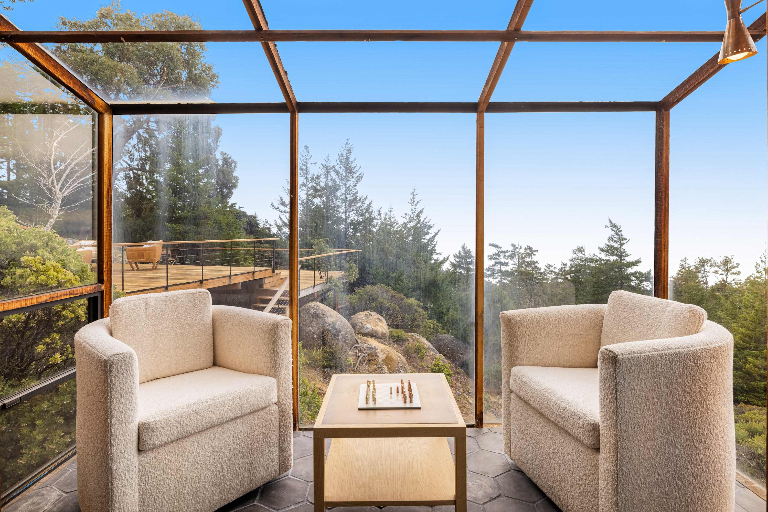 Sip your favorite drink in this serene outdoor space, where the gentle breeze and stunning vistas create a peaceful retreat.