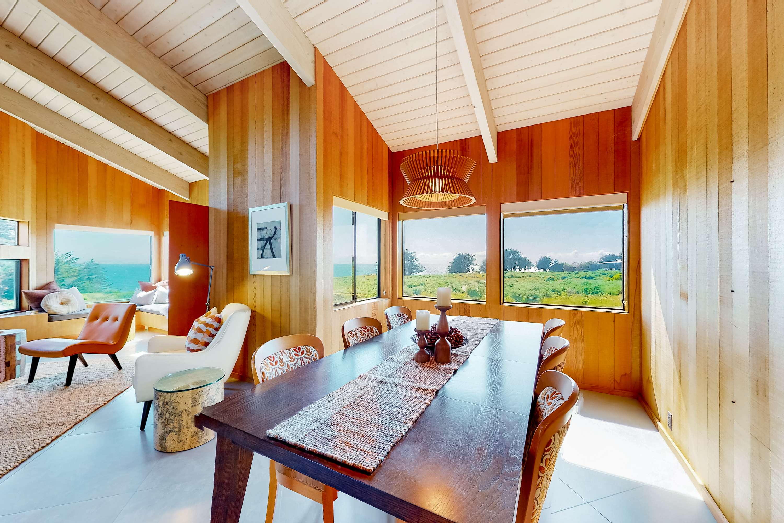 Gather around the dining table, where ocean views enhance every meal, making each dining experience feel like a special occasion.