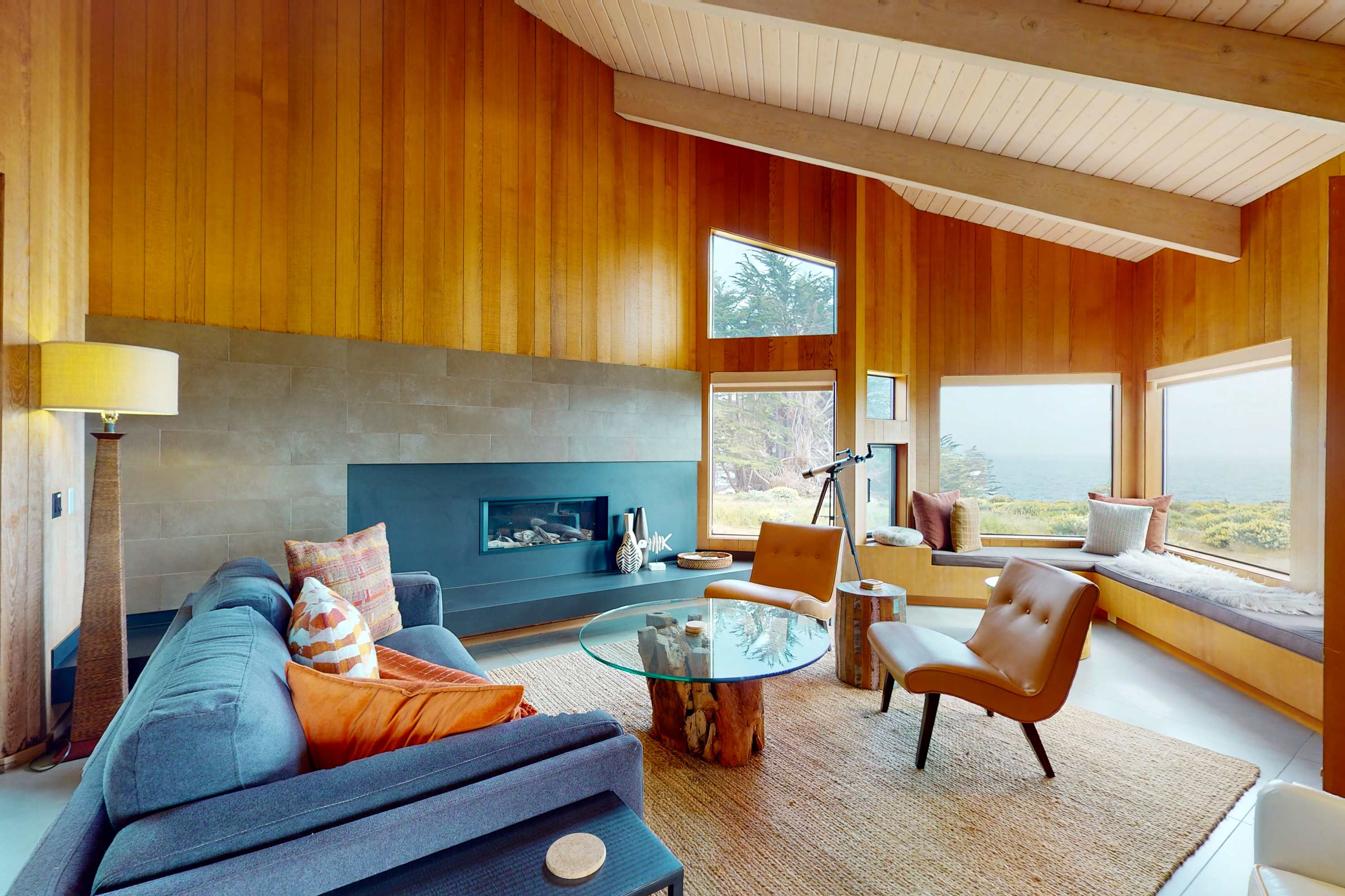Bask in the coastal light as you unwind in the inviting living room, where the ocean view transforms every moment into a serene escape.