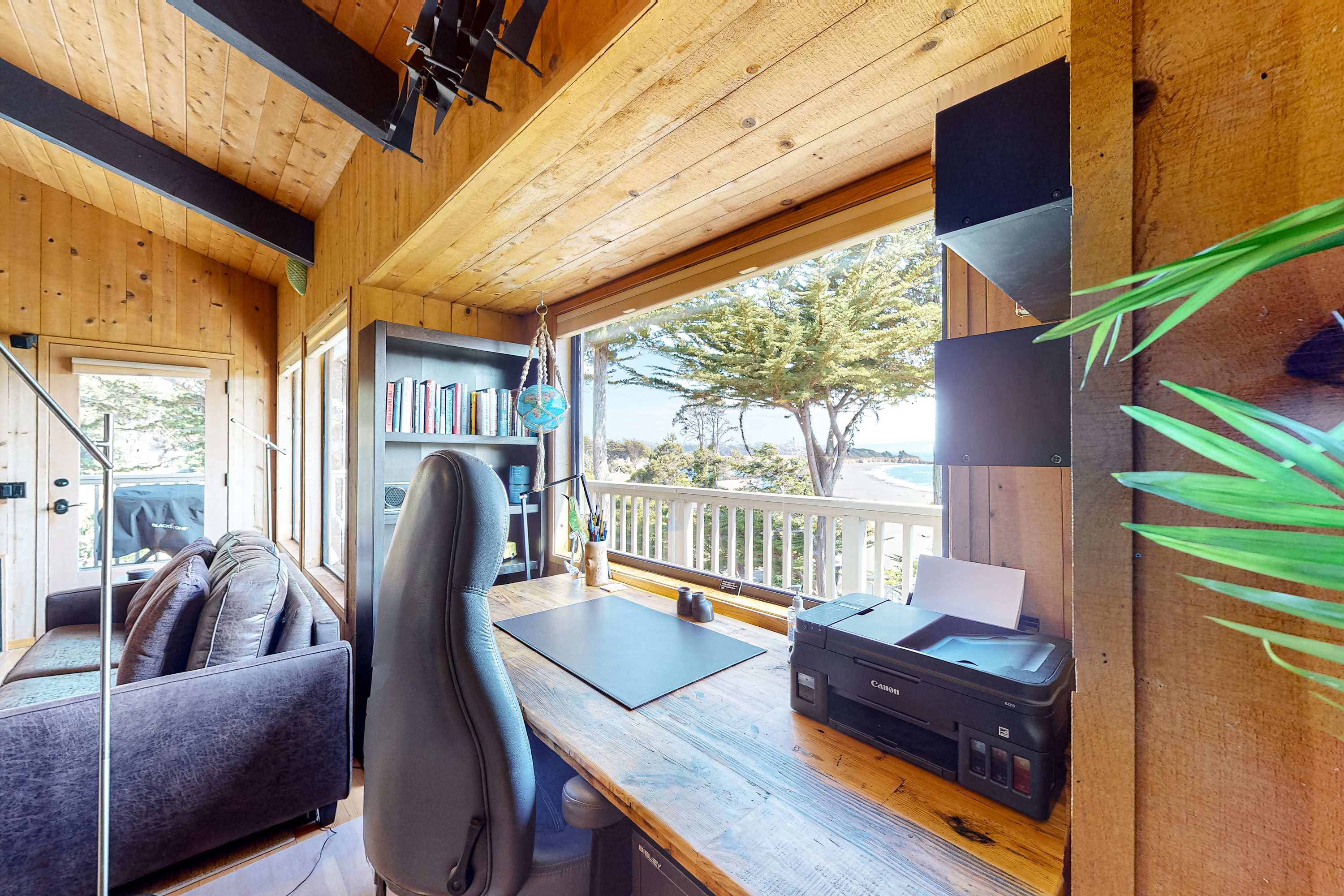 Your cozy office nook invites creativity, with stunning views reminding you to take breaks and savor the beauty outside.