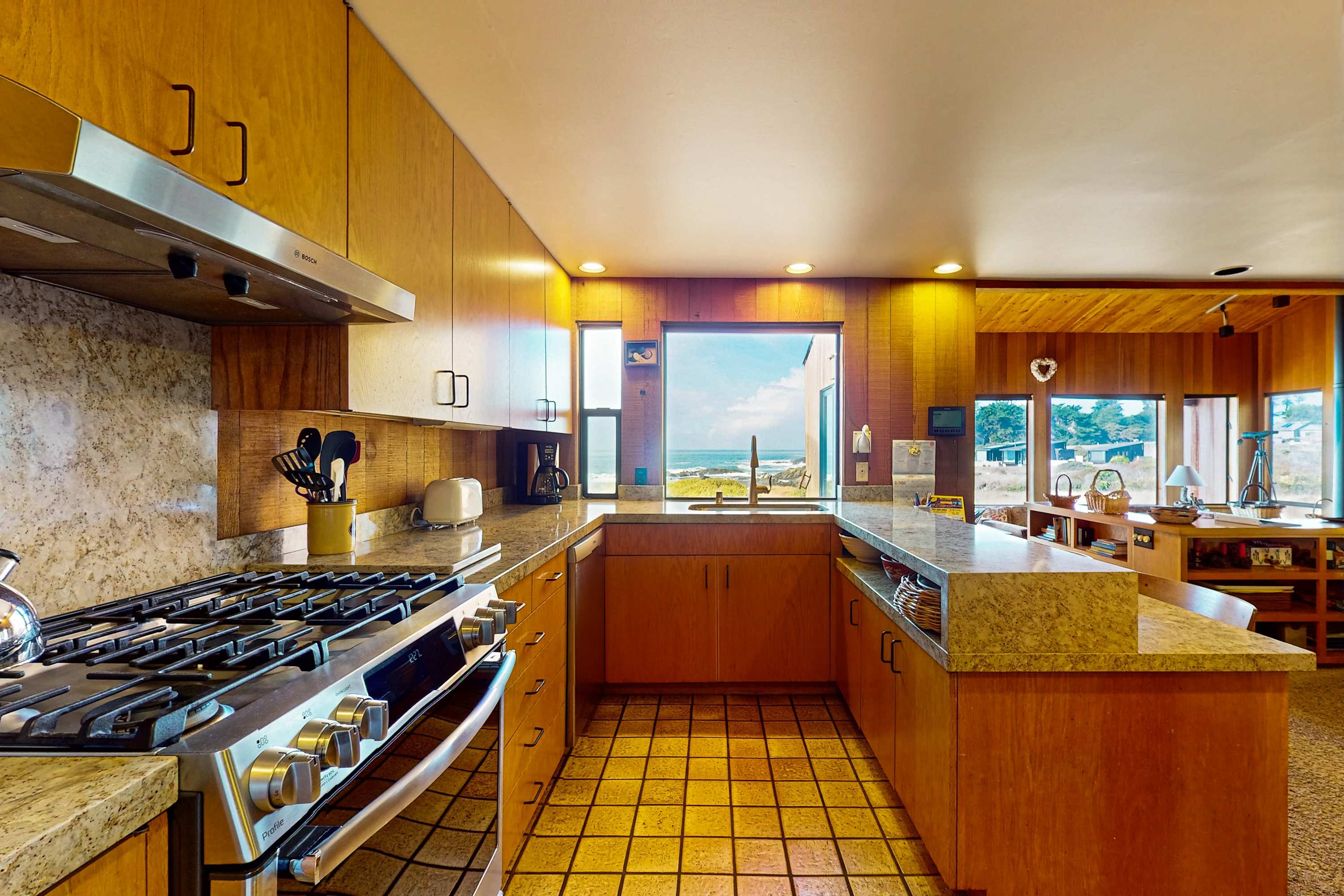 Cook up your favorite meals in this spacious kitchen, designed with ocean views to inspire your culinary creativity.