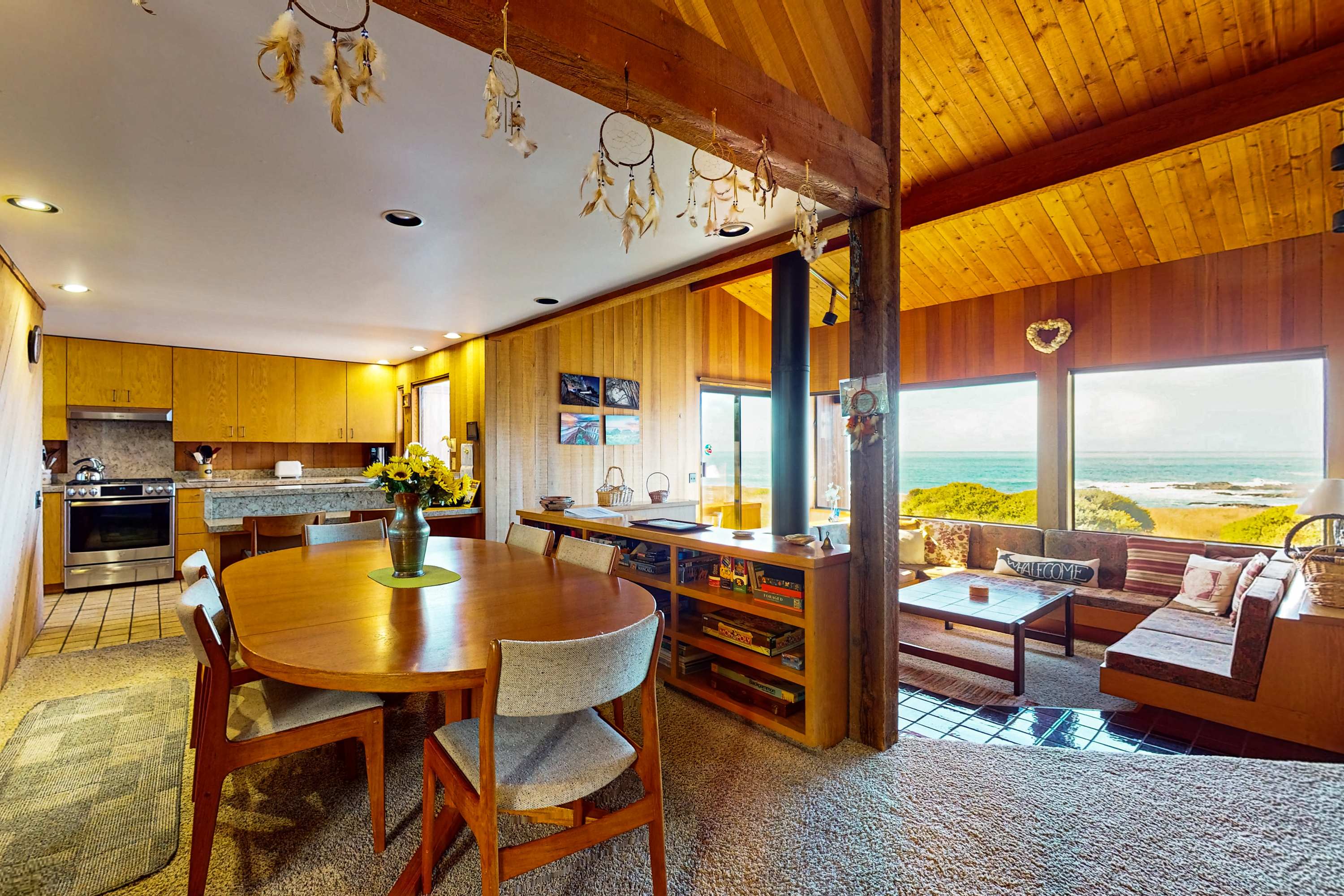 Share meals with loved ones at this sunlit dining area, where every meal is enhanced by the stunning scenery outside.