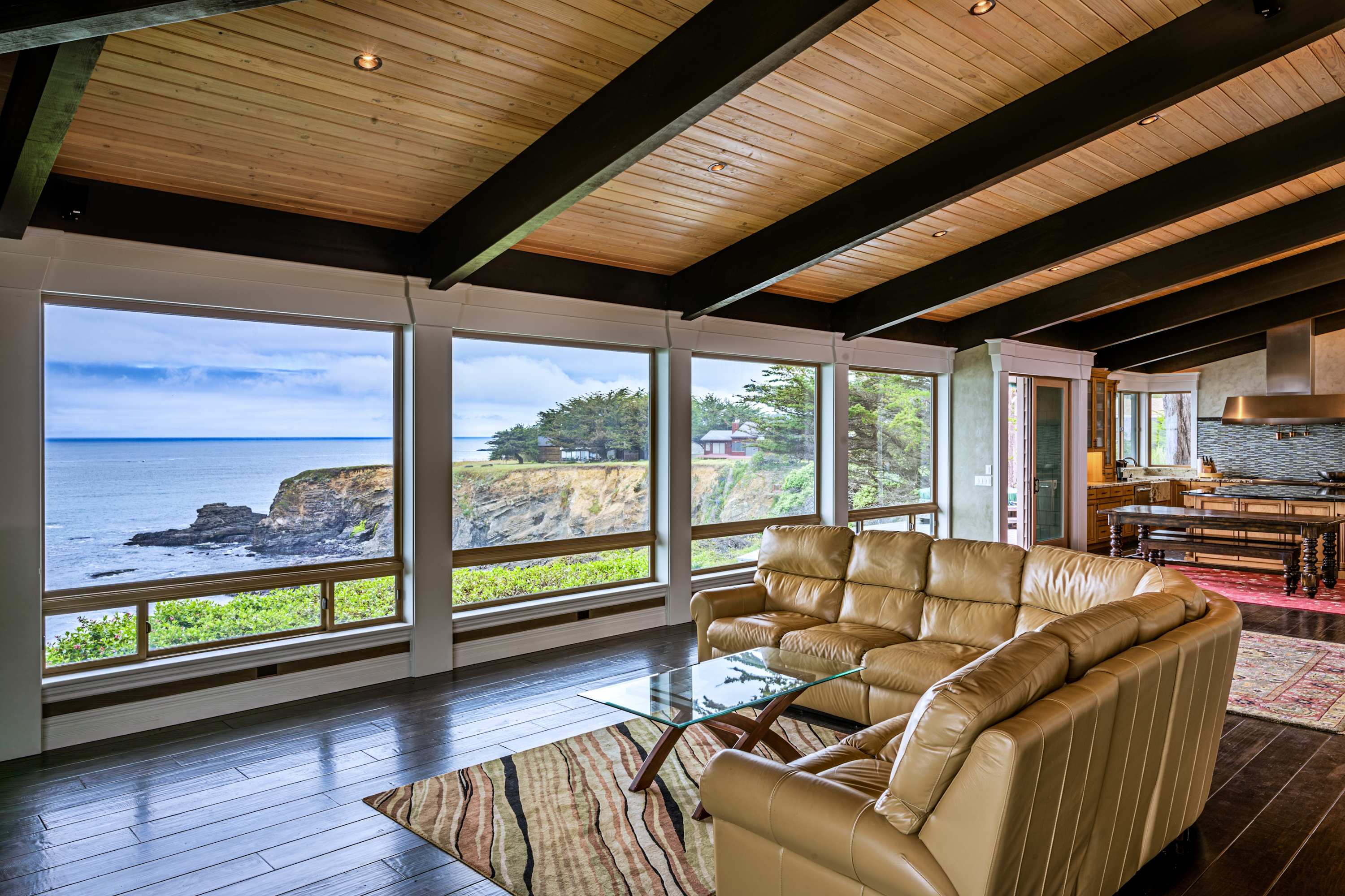 Witness the beauty of coastal living from this stunning living space, where the ocean is your ever-changing backdrop.