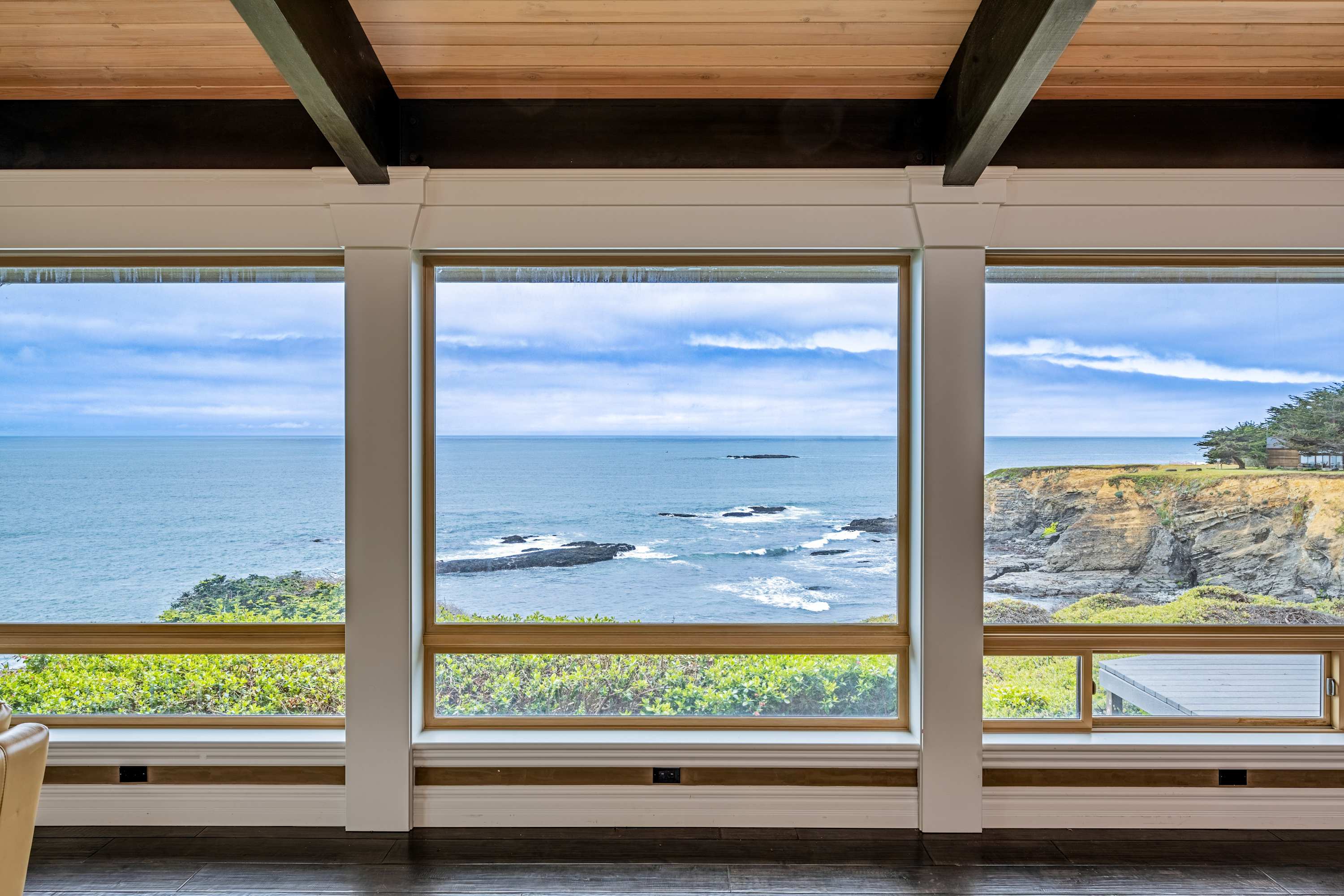 Gaze out at the tranquil waves from this beautiful vantage point, where every moment feels like a postcard.